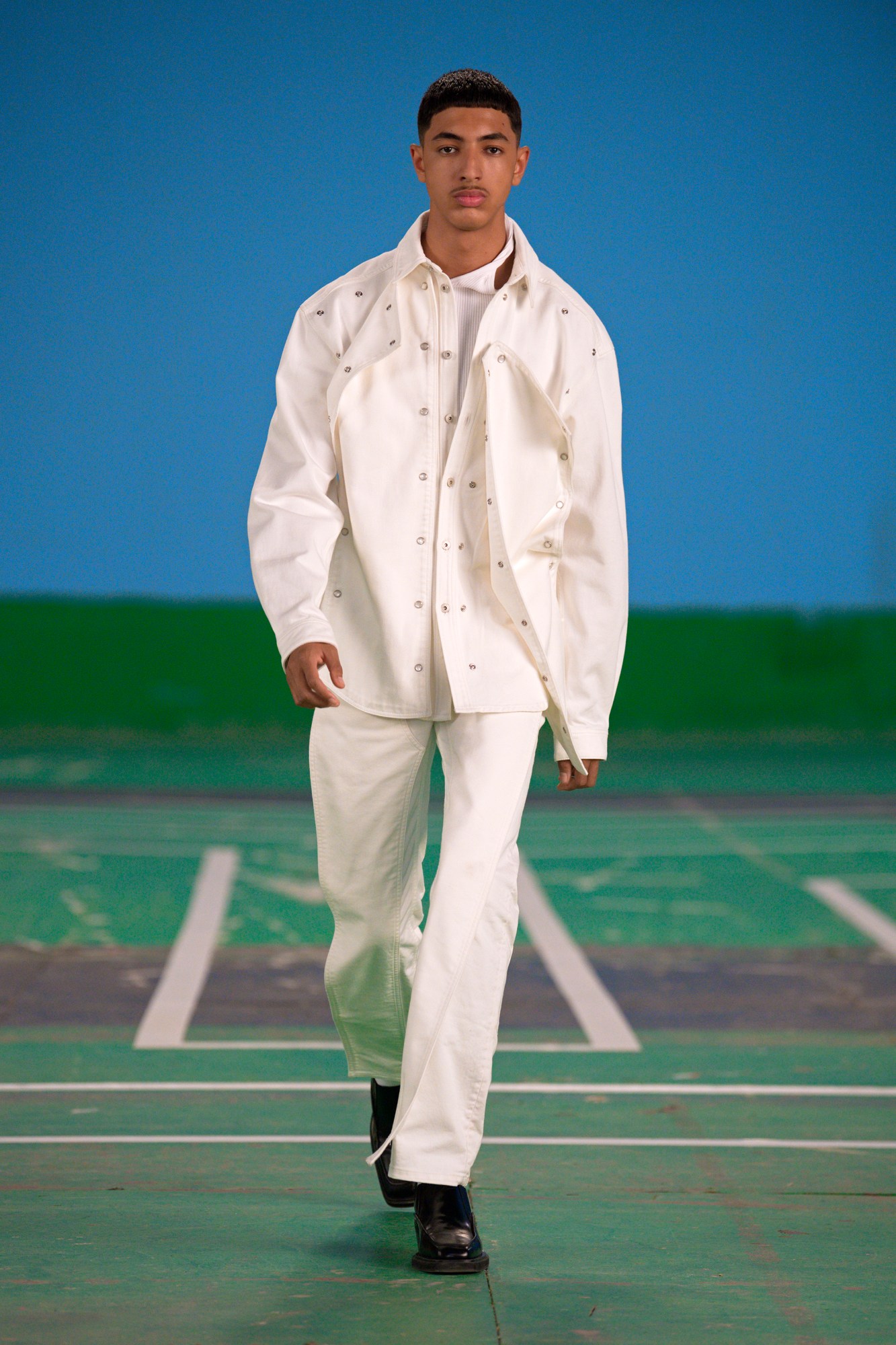 A model wearing a full look from Y/Project's SS22 collection