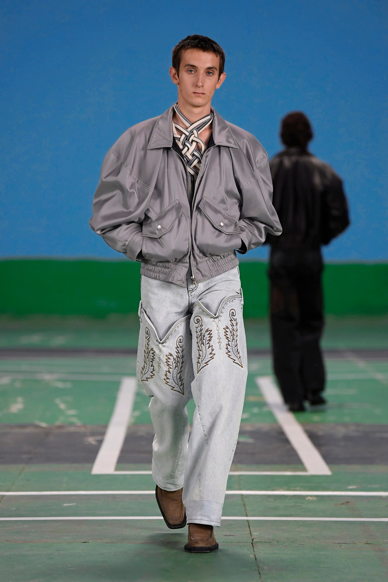 A model wearing a full look from Y/Project's SS22 collection