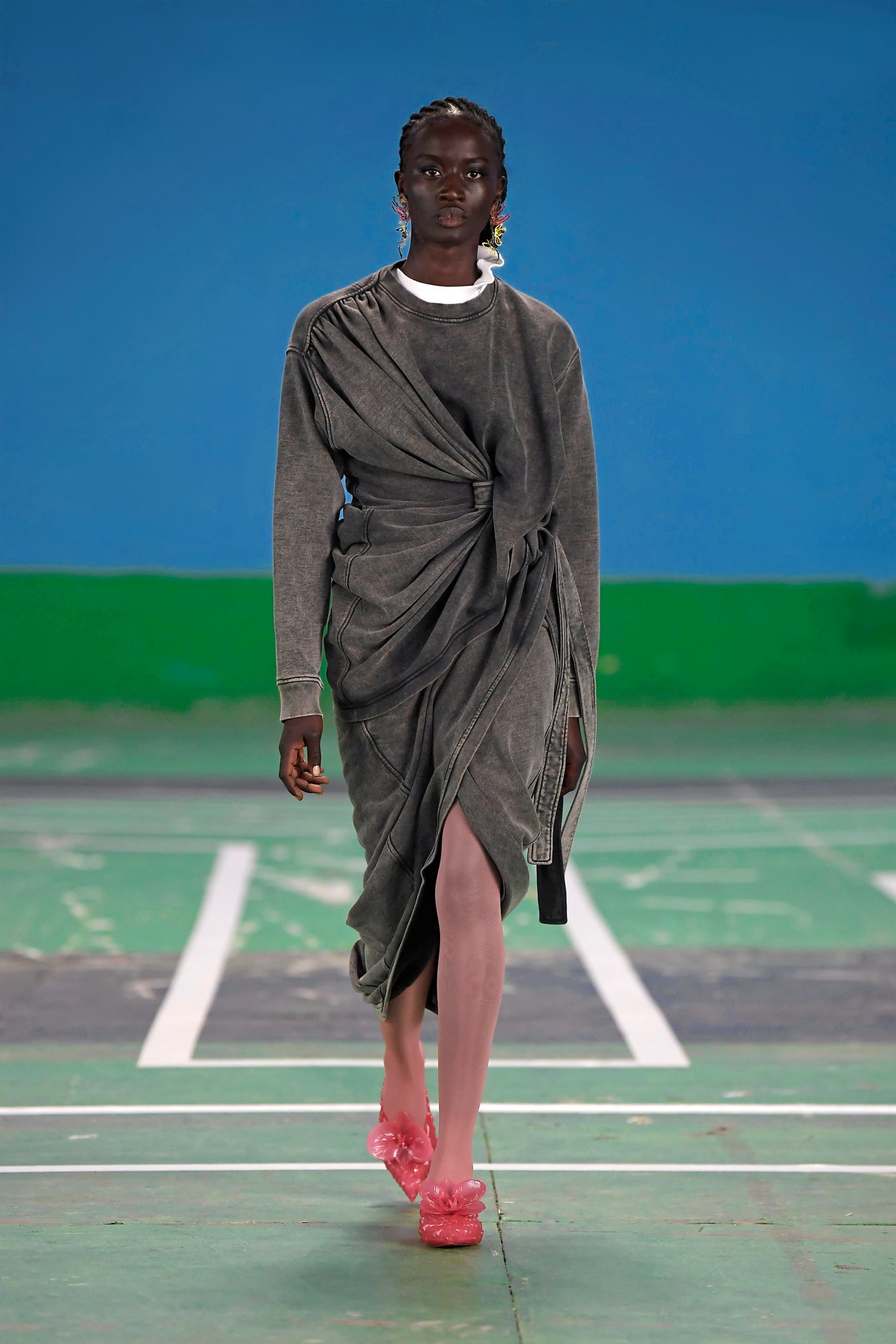 A model wearing a full look from Y/Project's SS22 collection