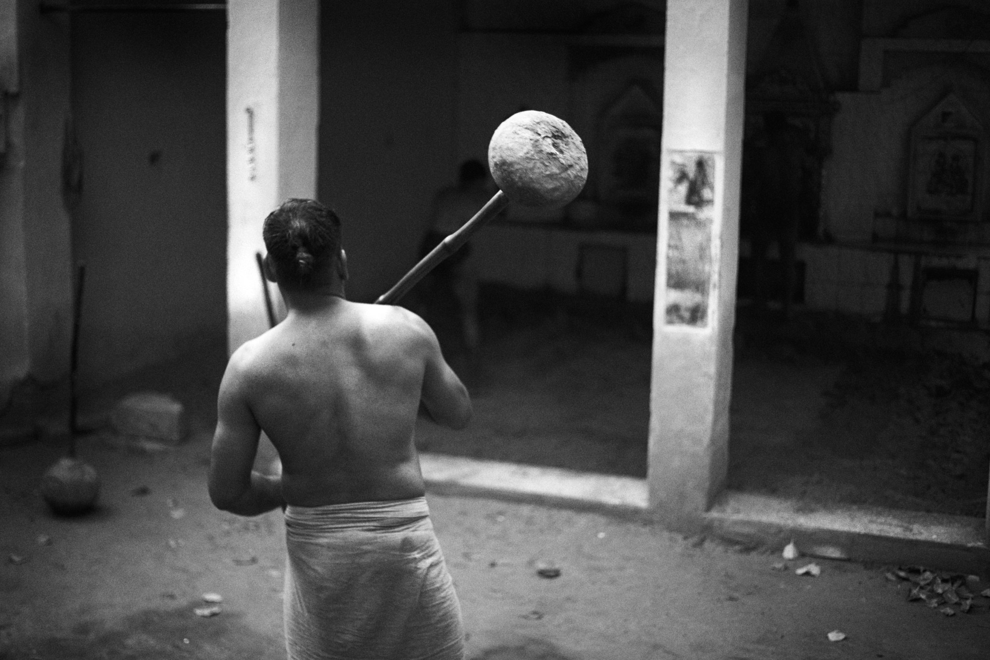 a man with a handmade weight training