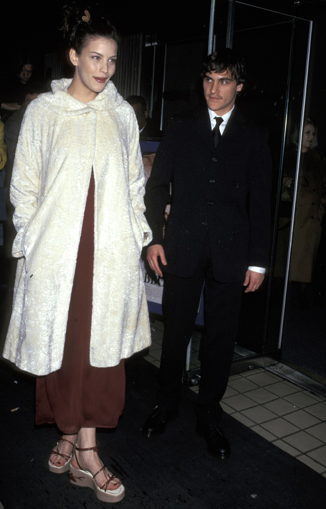 liv tyler at a movie premiere with joaquin phoenix