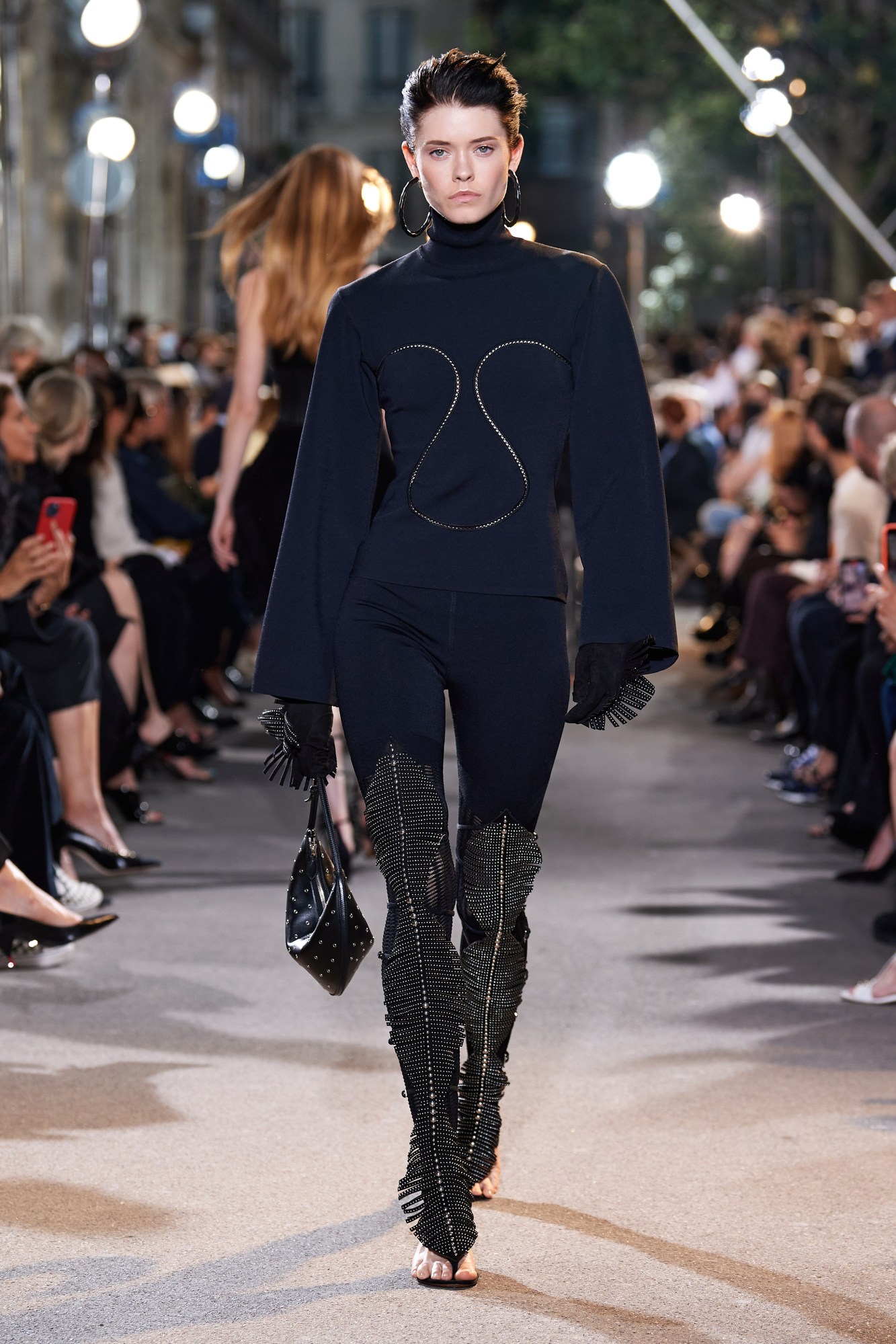 A model walking in Alaïa's SS22 show