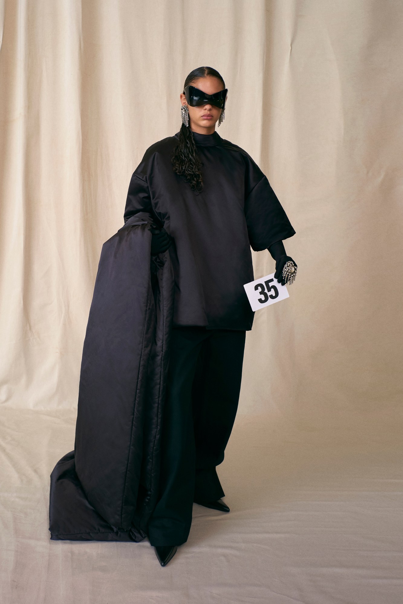 A model wearing a look from Balenciaga Couture AW21