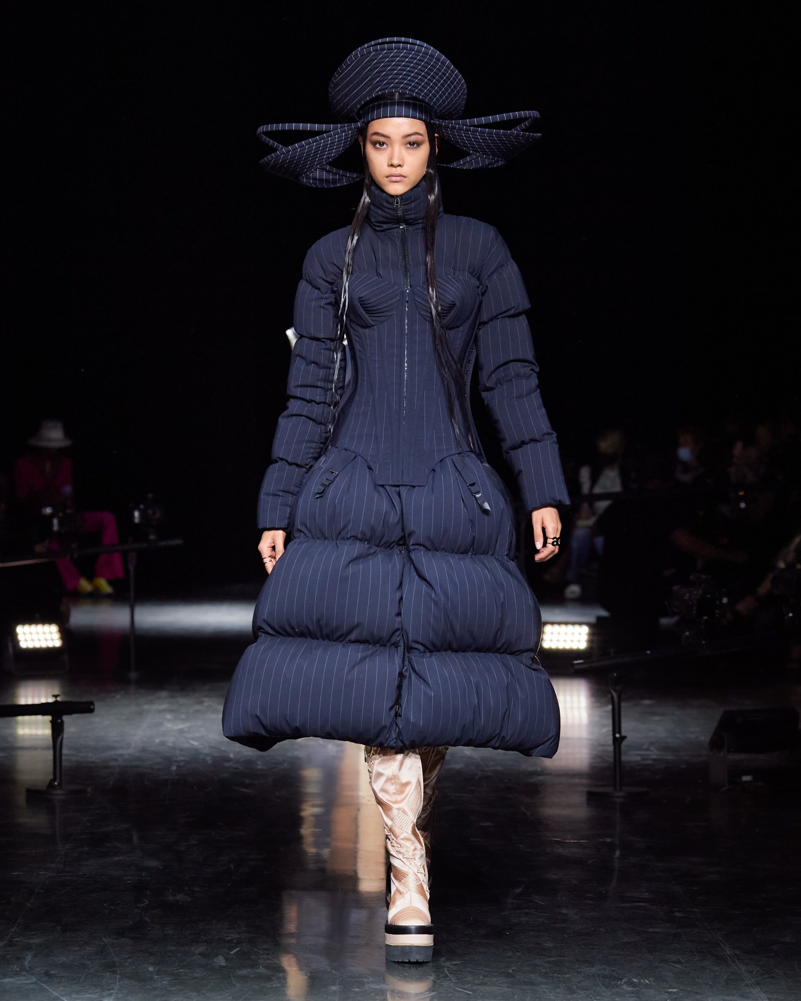 A model wearing a full look for Jean Paul Gaultier x sacai couture