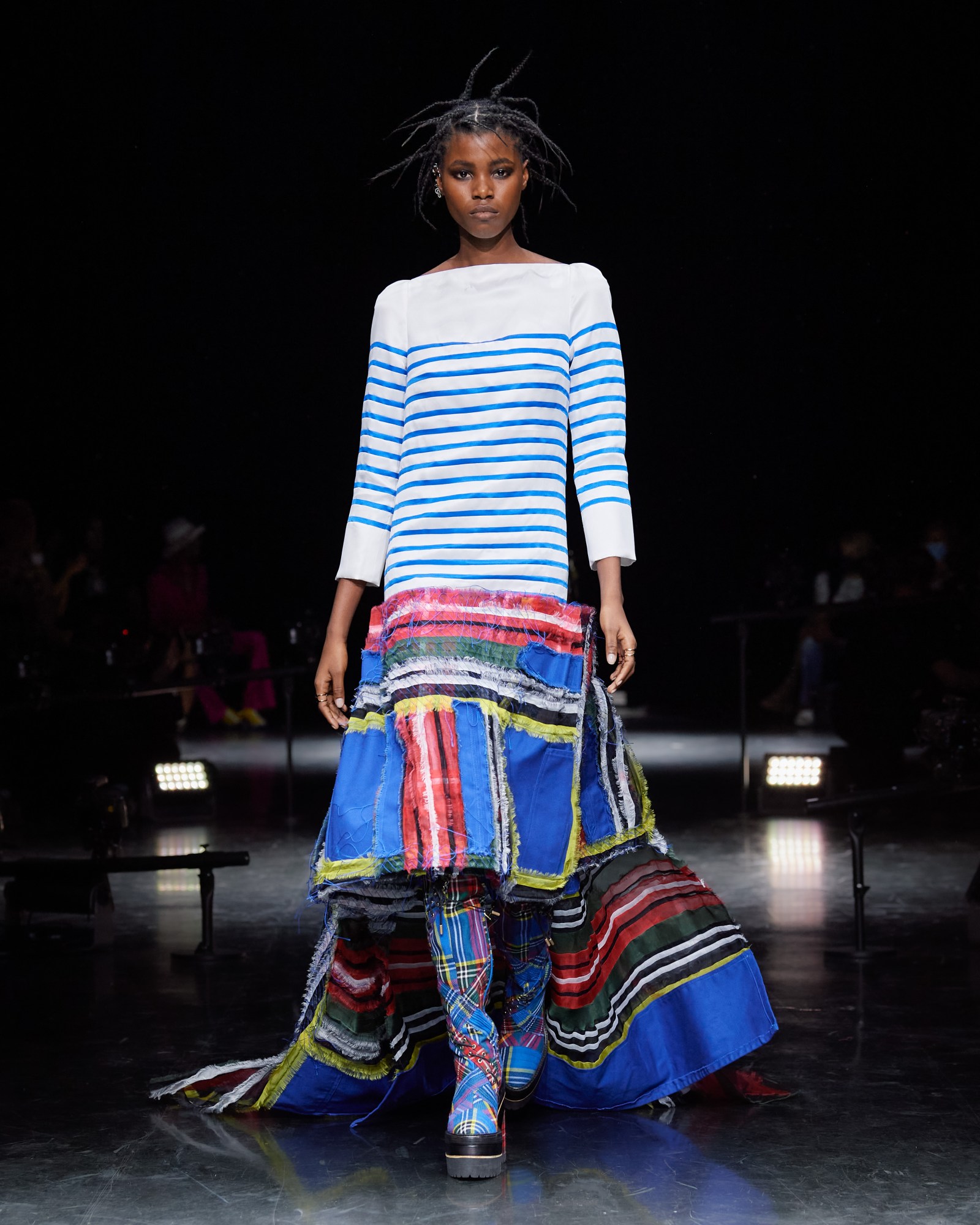 A model wearing a full look for Jean Paul Gaultier x sacai couture