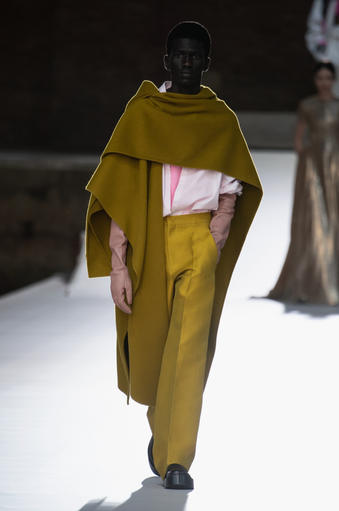 A model wearing a full look from Valentino's AW21 collection