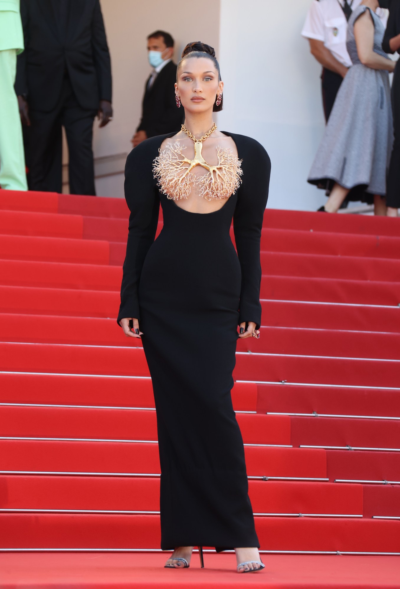 bella hadid wearing schiaparelli on the red carpet at cannes film festival 2021