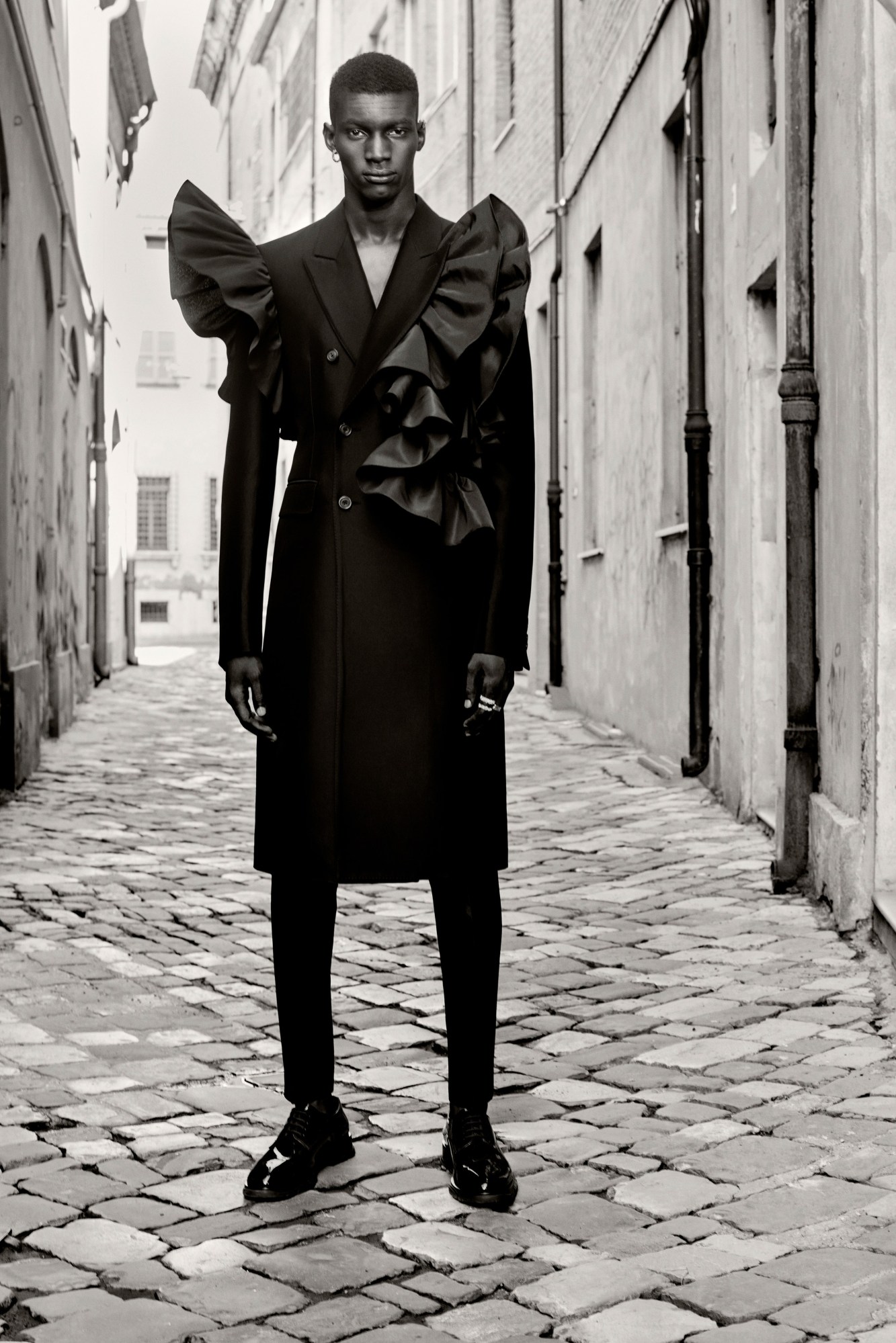 A model wearing a look from Alexander McQueen SS22 Menswear