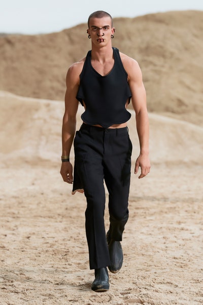 a model wearing burberry ss22 menswear halter top