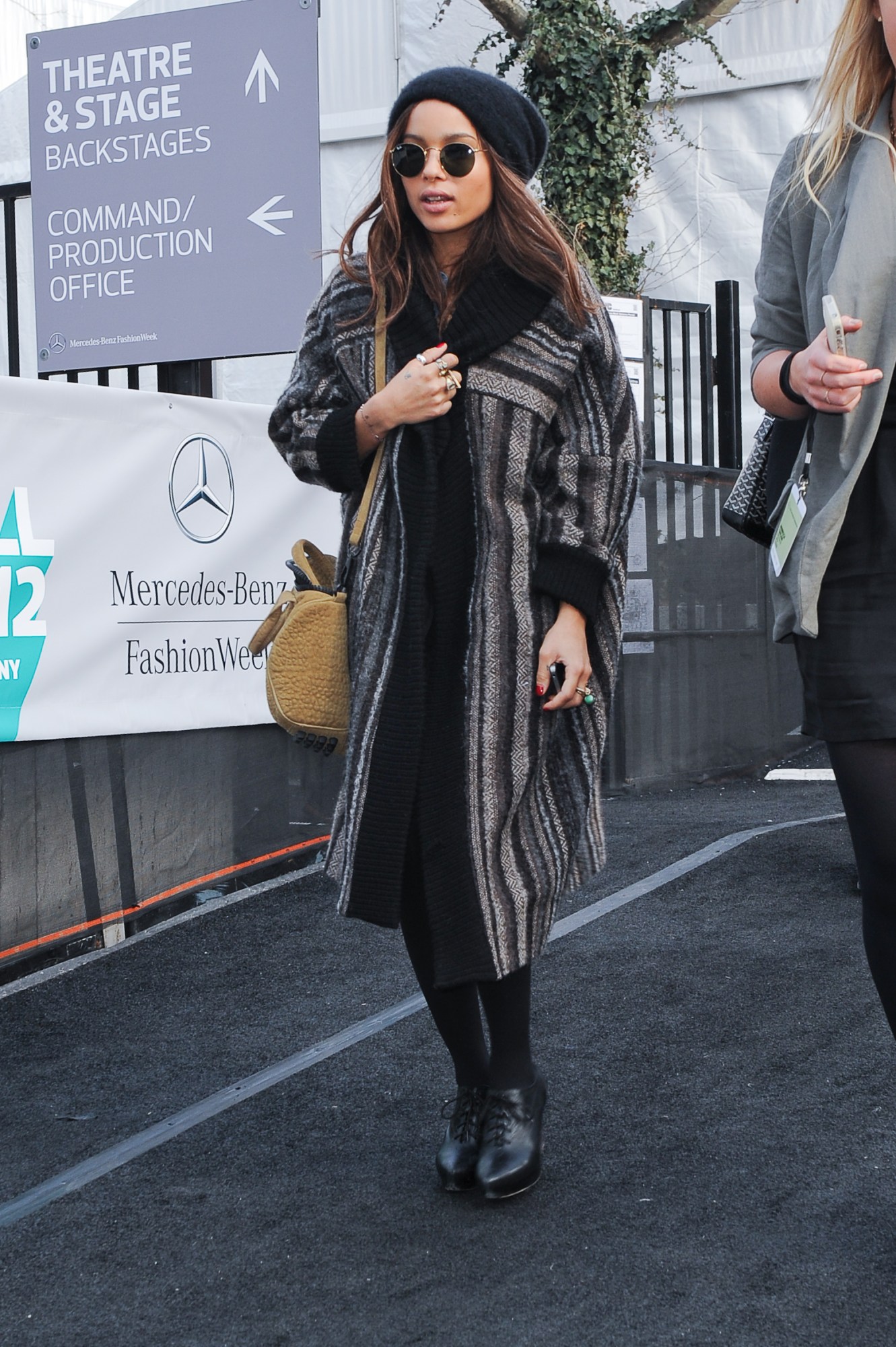 zoe kravitz wearing a beanie and sunglasses walking in new york city 2012