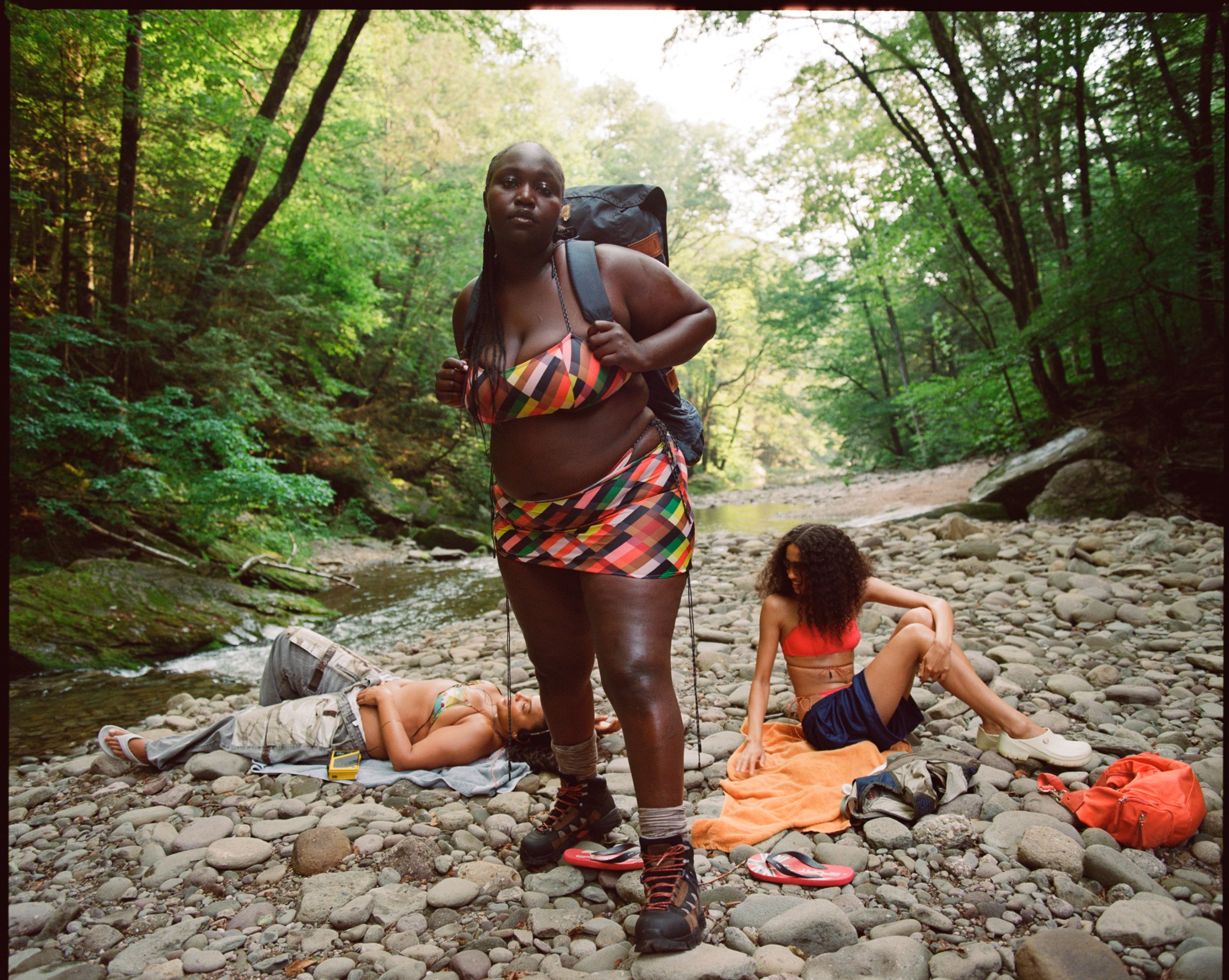 A model wearing a colourful swimsuit by Paloma Elsesser x Dos Swim