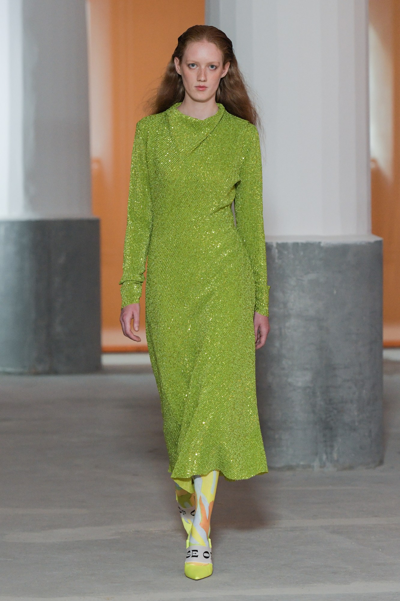 A model walking the runway at Stine Goya SS22.