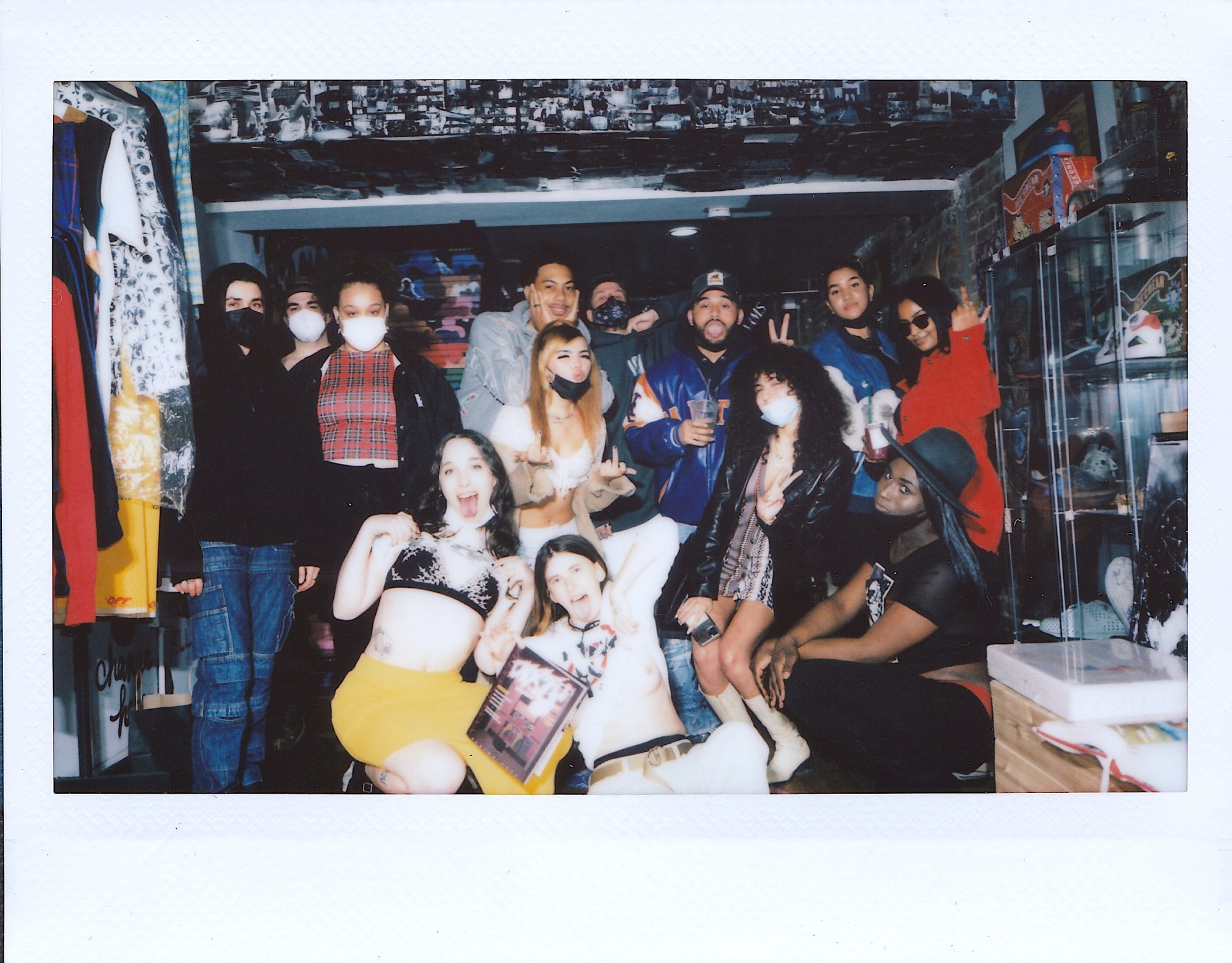 a group of dirty magazine collaborators posing in a new york apartment