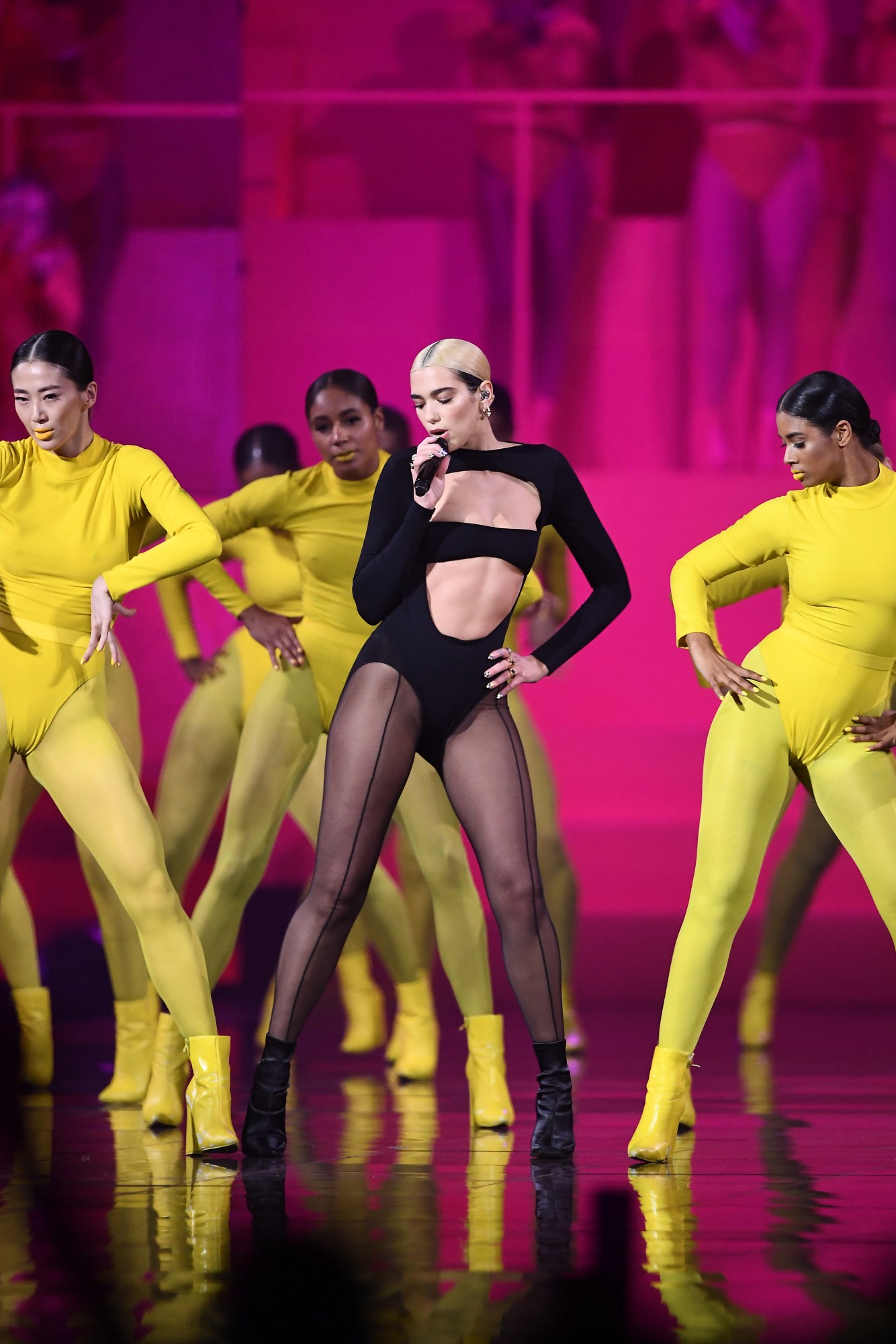 dua lipa dancing on stage in a mugler catsuit with backup dancers mtv emas 2019