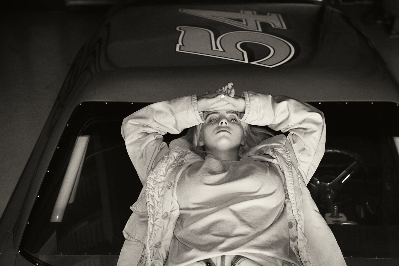 billie eilish on the roof of a car