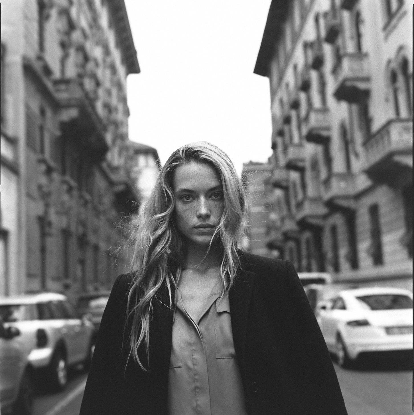 A black and white portrait of Hannah Ferguson in Milan