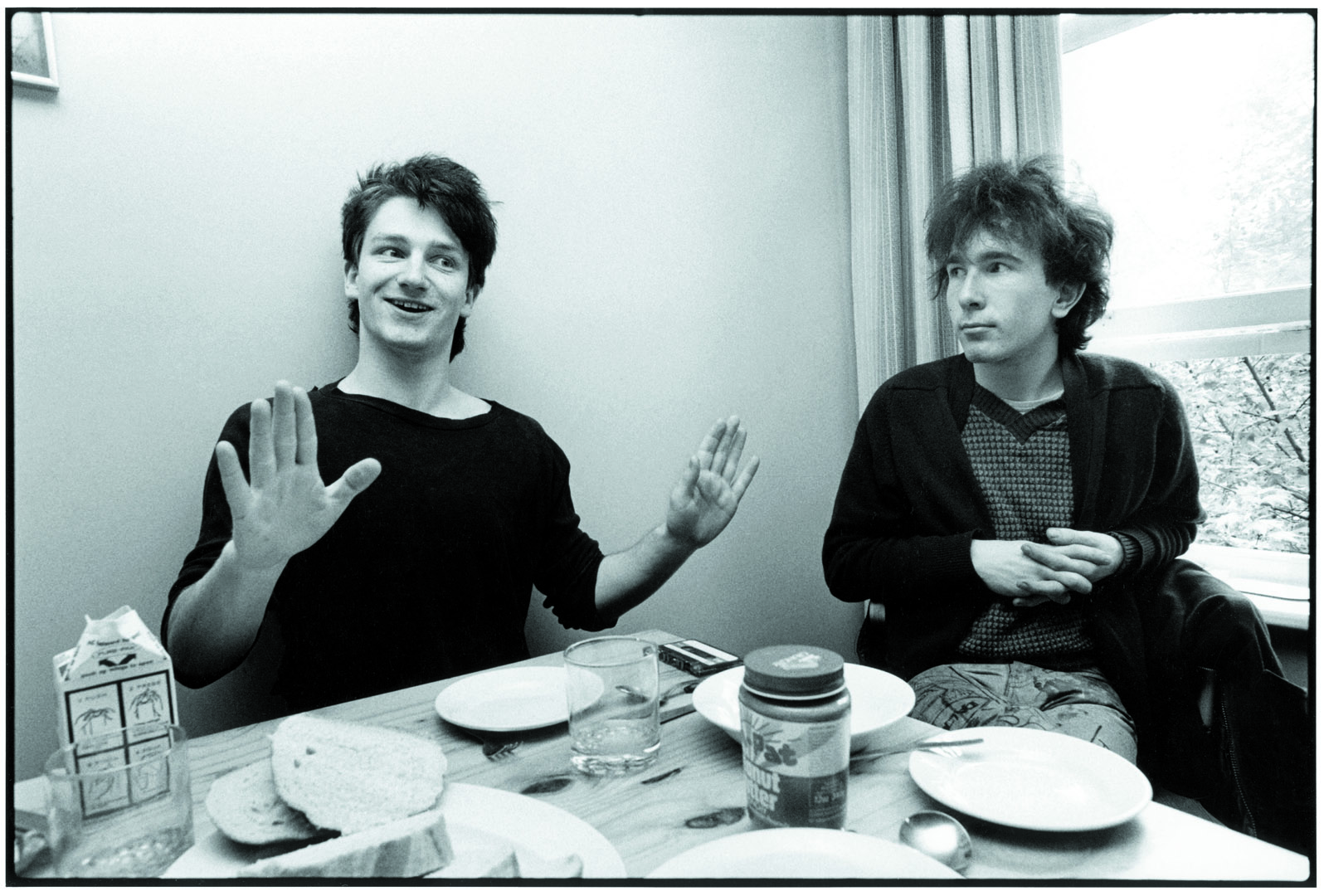 a photo of u2 at a dinner table by pierre rene-worms