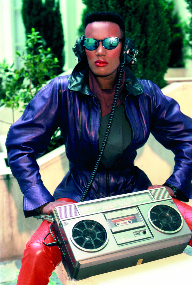 a portrait of grace jones in sunglasses with her boombox by pierre rene-worms