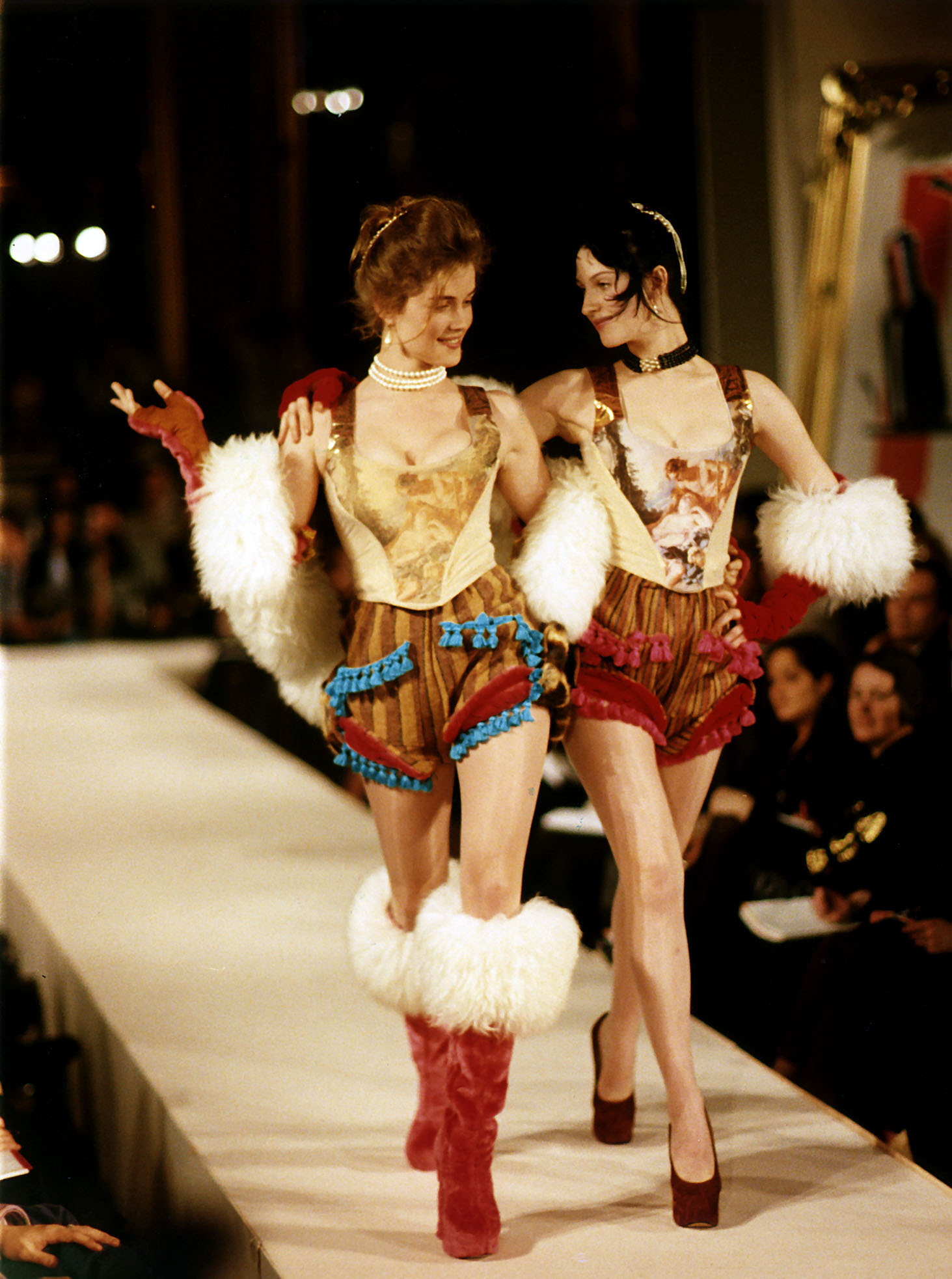 a 90s Vivienne Westwood runway show featuring models wearing baroque corsets