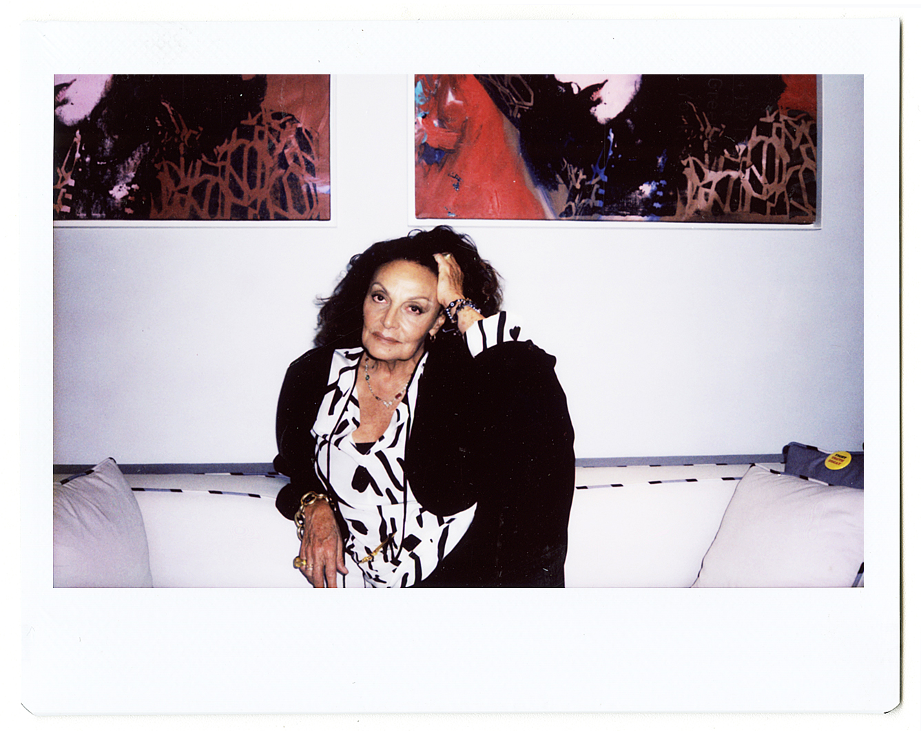 a polaroid portrait of diane von furstenburg on a couch by hugo huerta marin