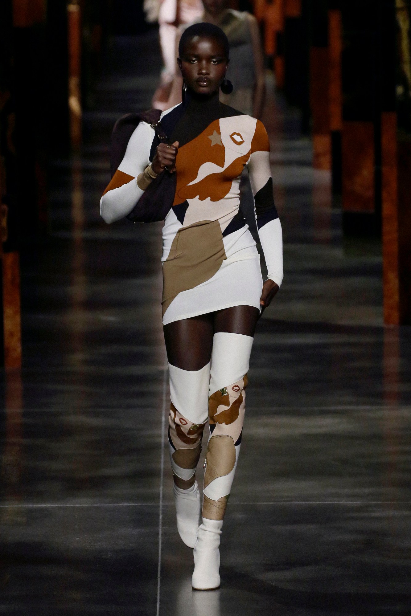 A model walks the runway at Fendi SS22