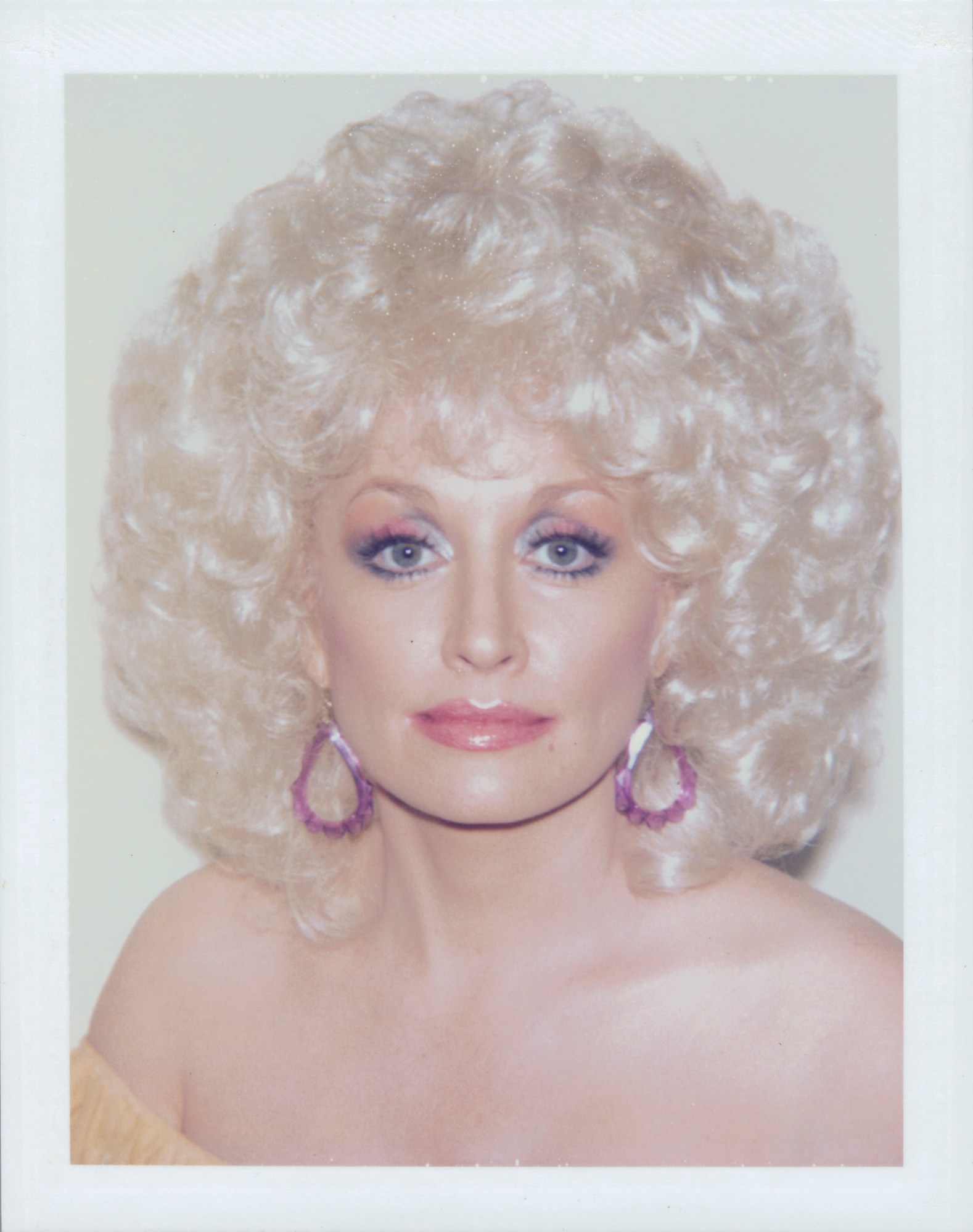 a polaraid of dolly parton by andy warhol