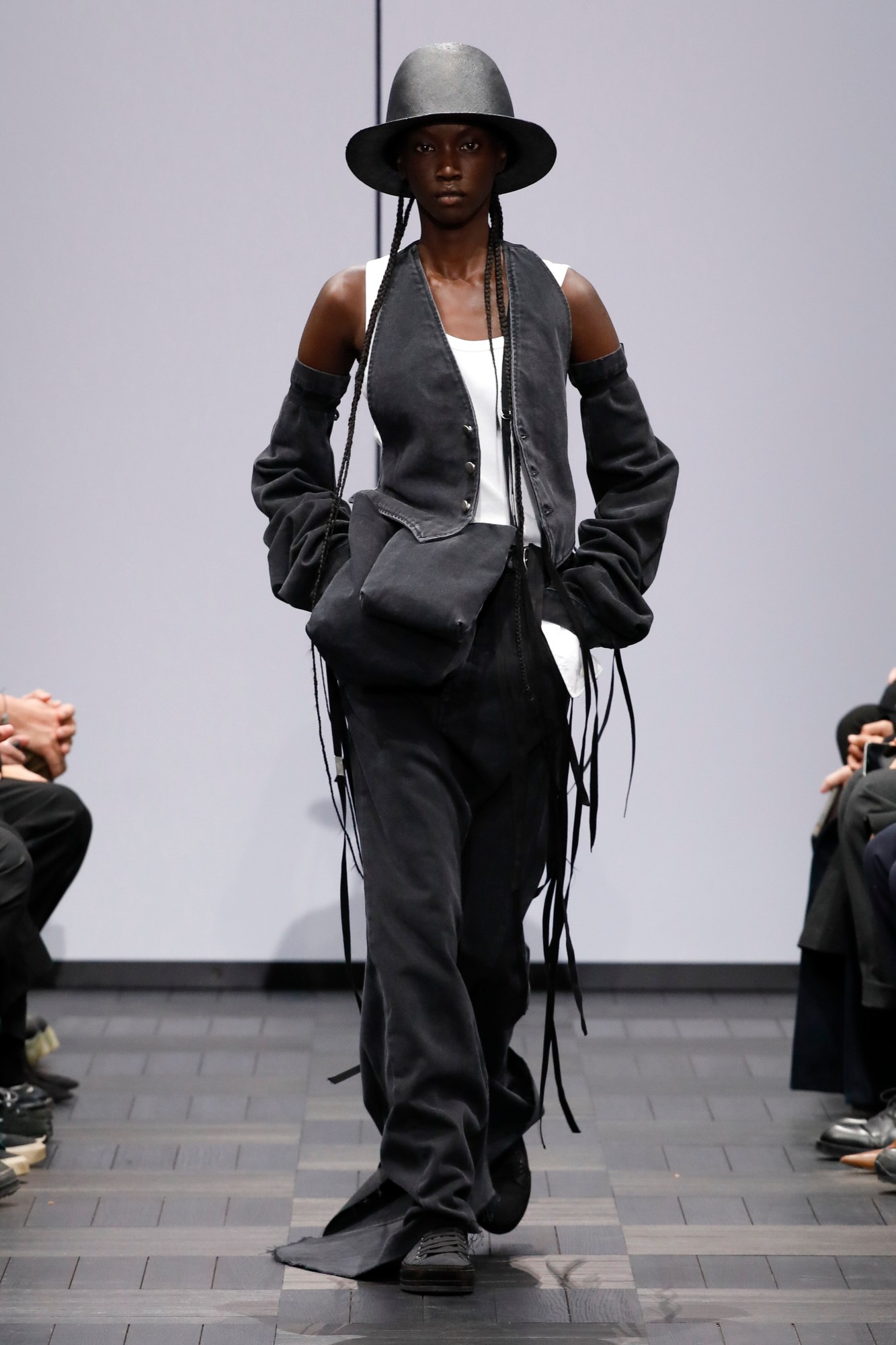 A model walking the runway at Ann Demeulemeester SS22