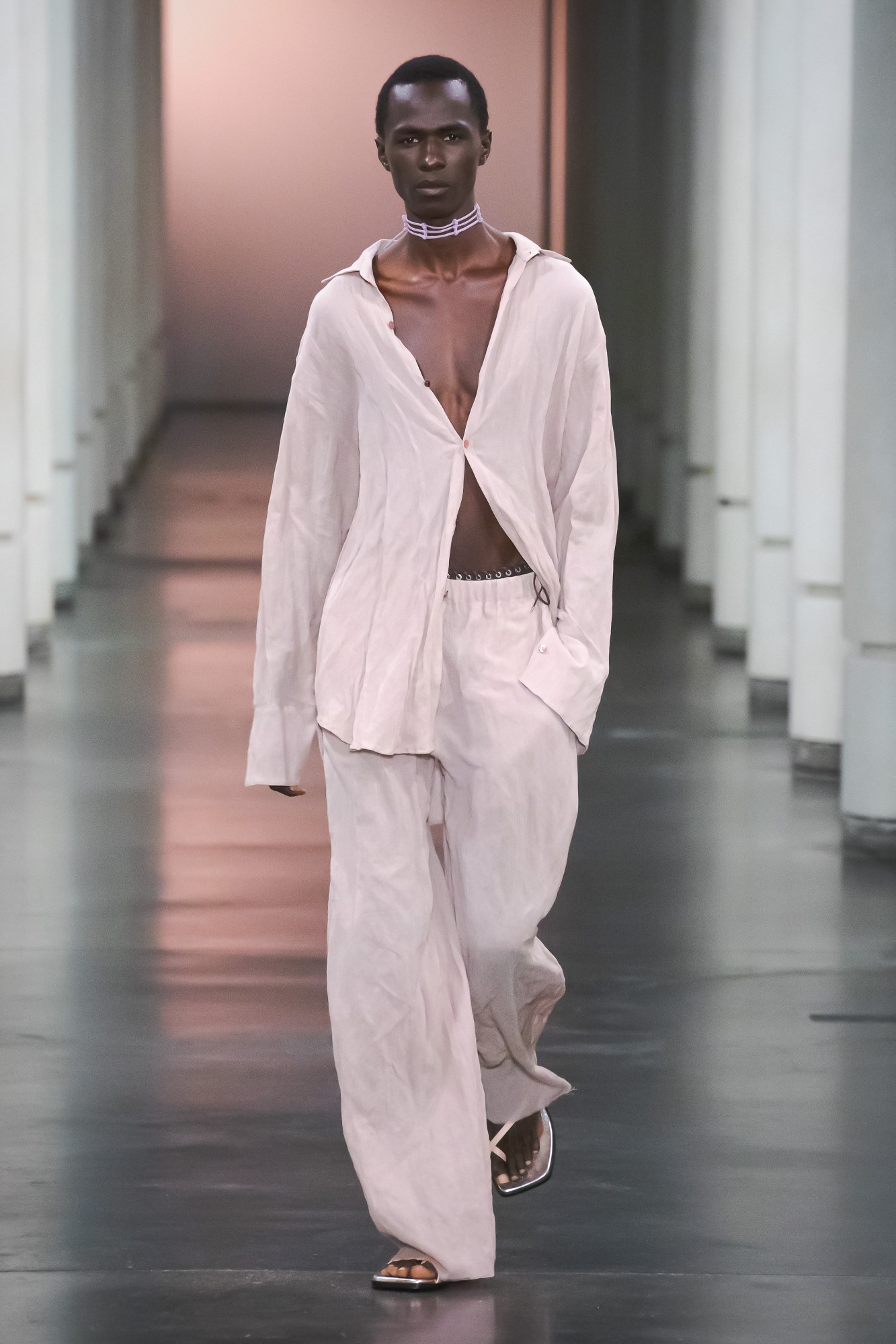 A model walking the runway at Ludovic de Saint Sernin SS22