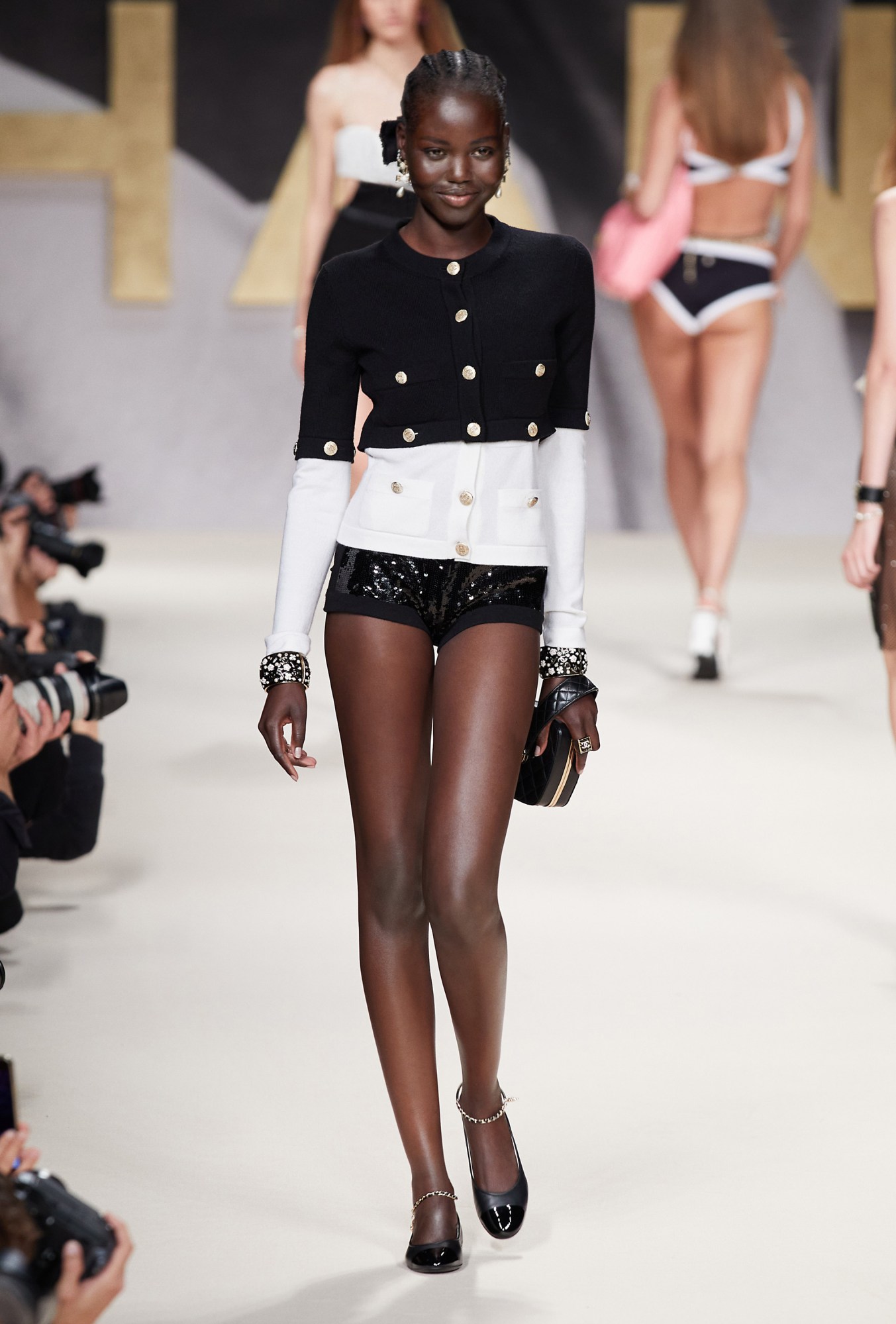 A model walking the runway at Chanel SS22