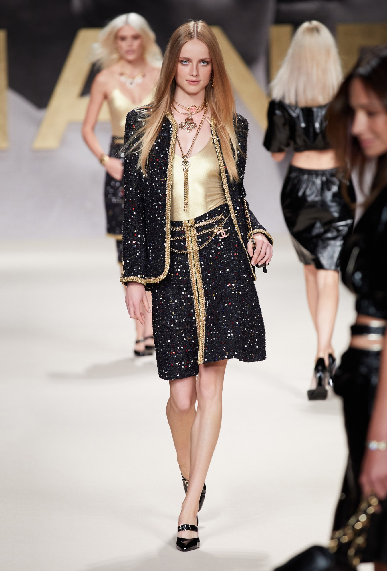 A model walking the runway at Chanel SS22