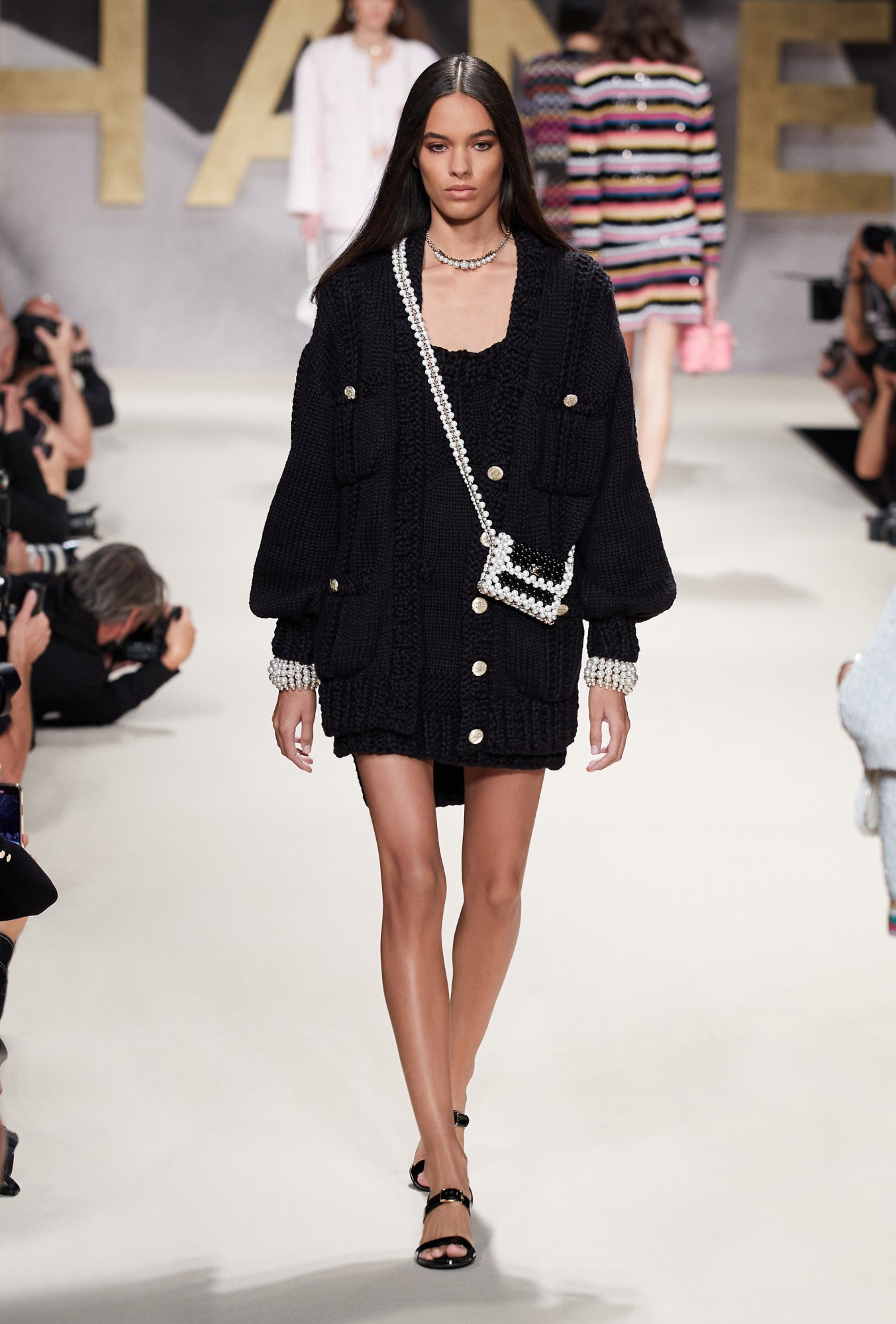 A model walking the runway at Chanel SS22