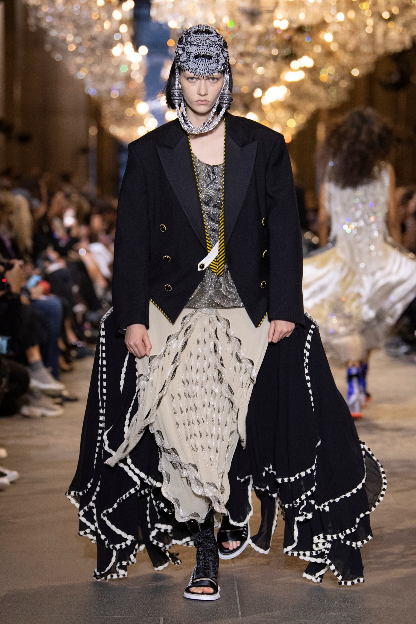 A model walking the runway at Louis Vuitton SS22