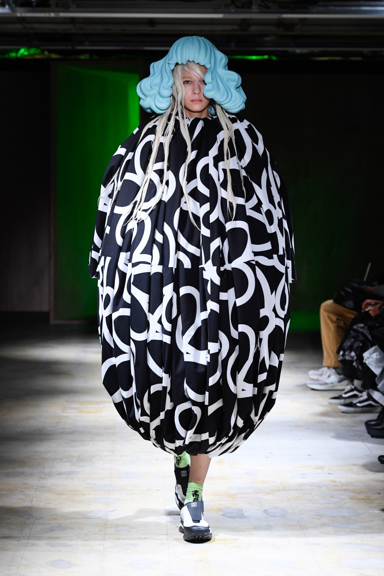 A model walking the runway at Comme des Garcons SS22