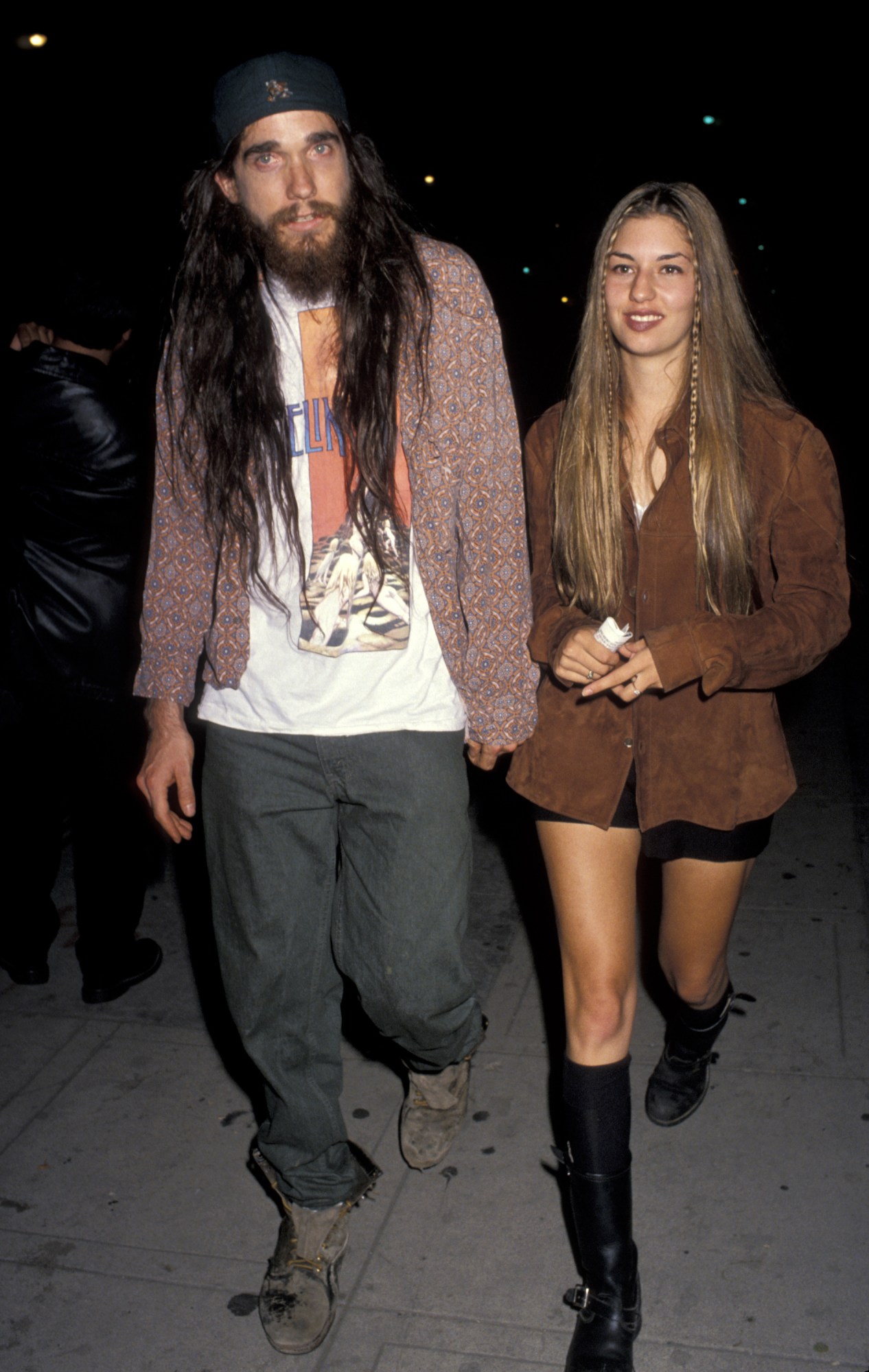 sofia coppola walking in new york in knee high boots and a short skirt 1992