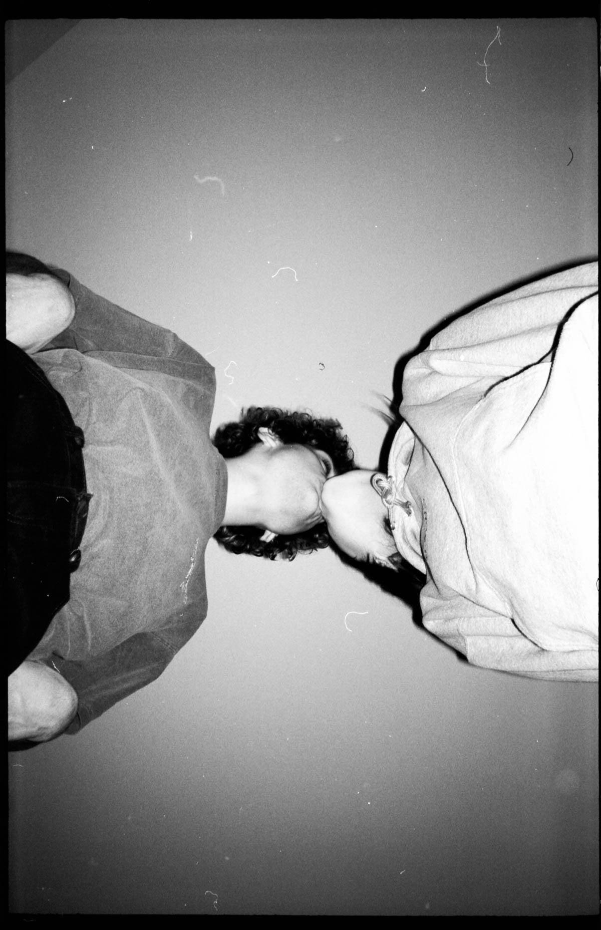 two people kiss, taken from below