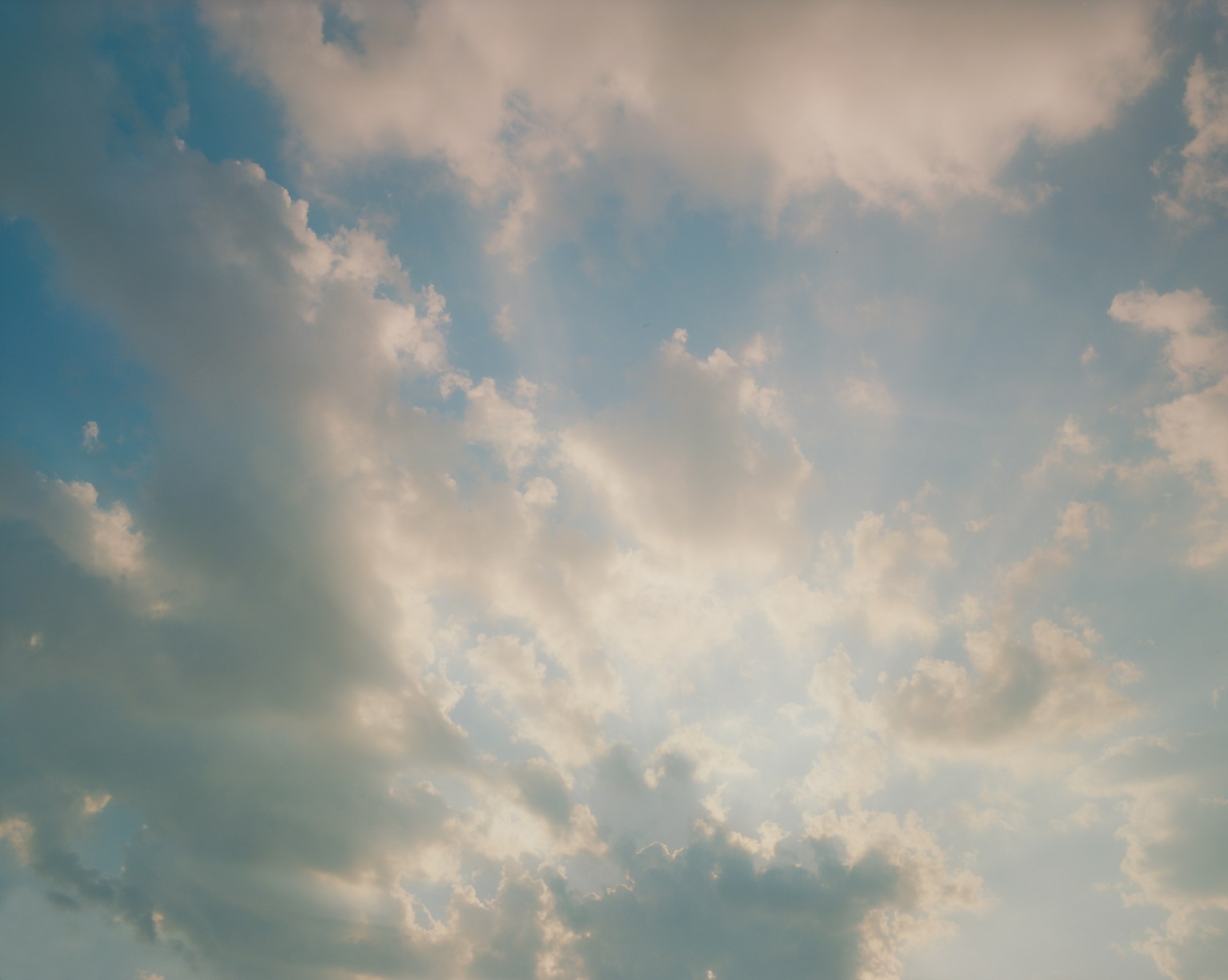 blue cloudy skies