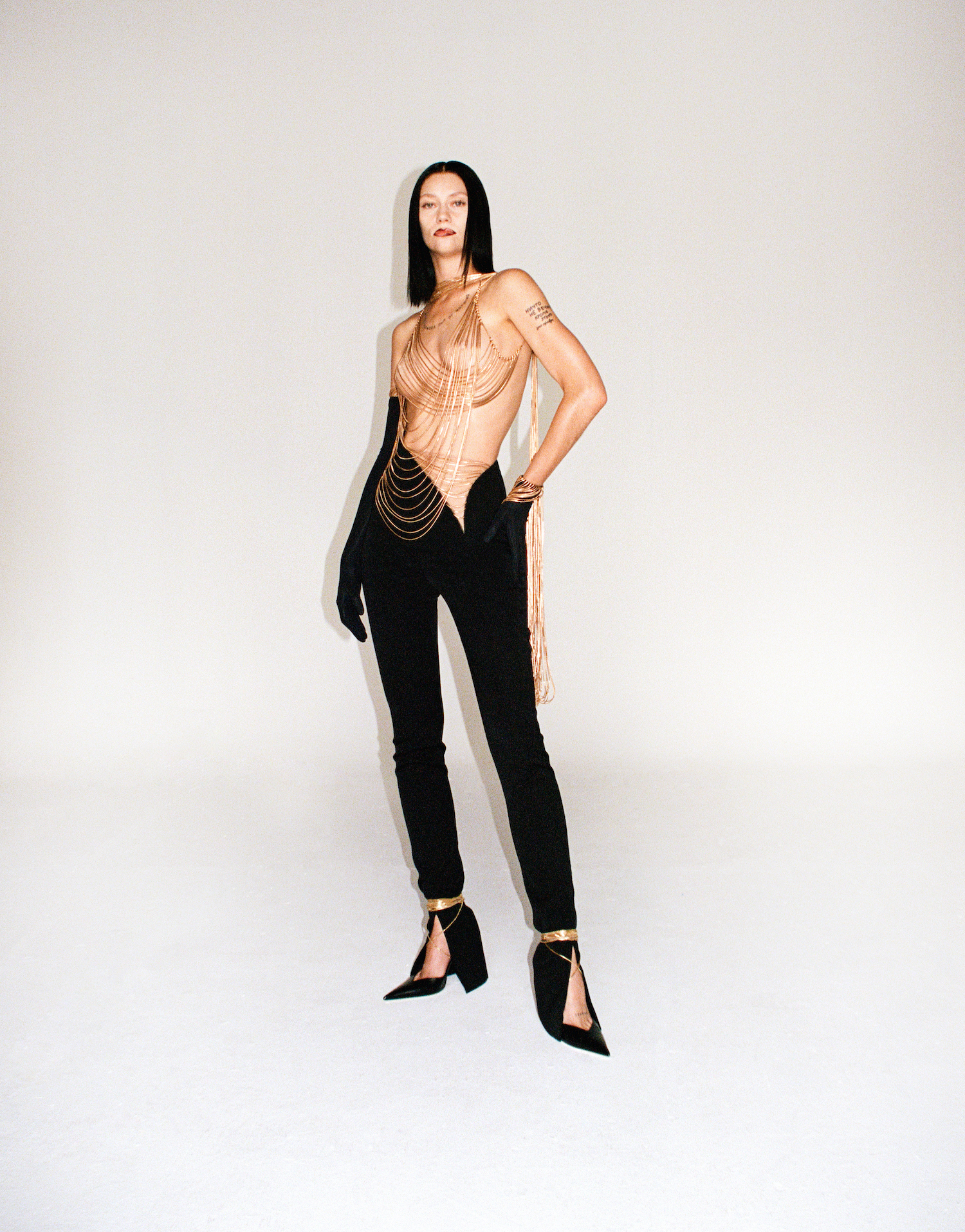 a model posing in mugler aw21