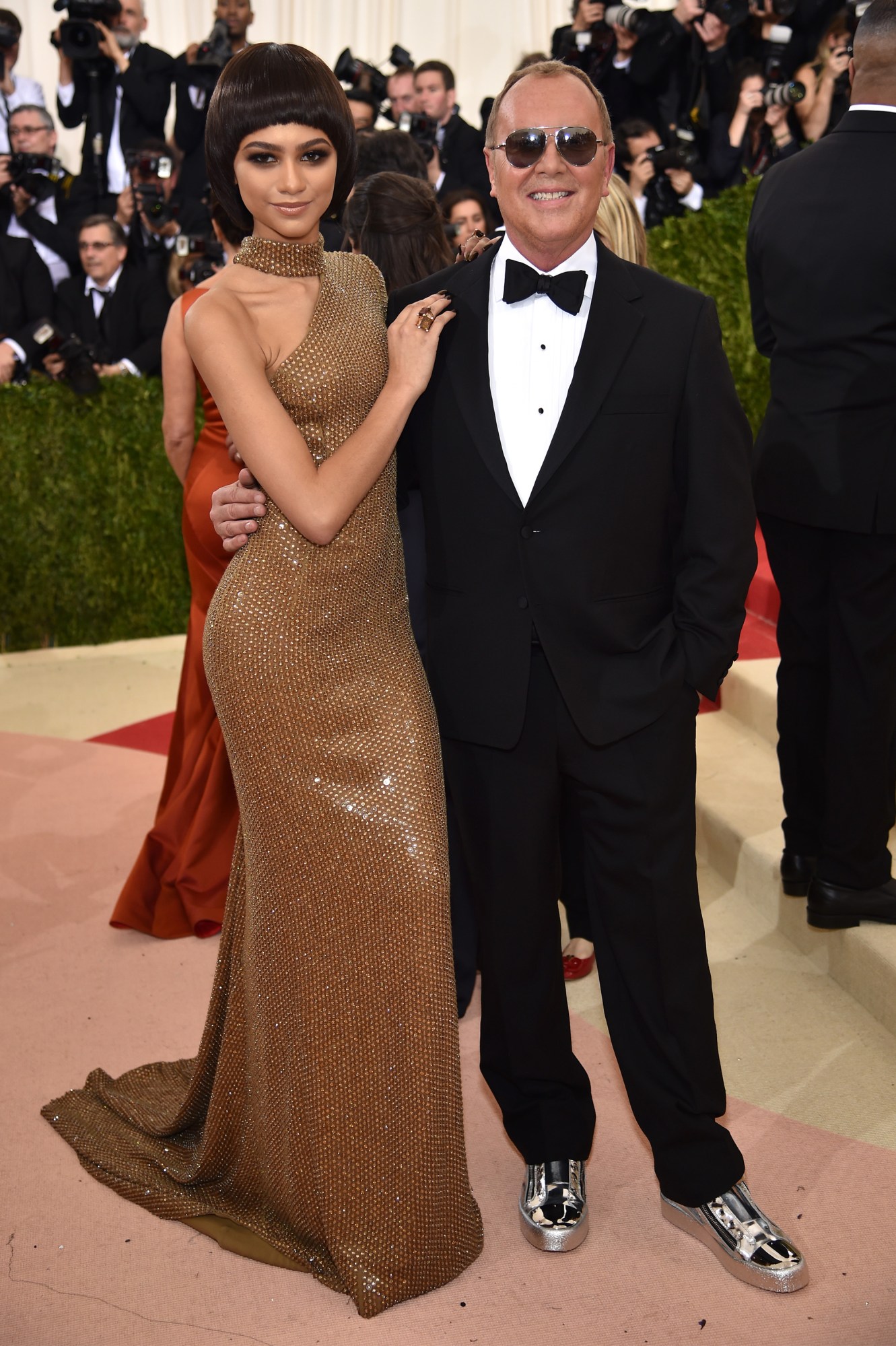 zendaya posing with michael kors at the met gala 2016