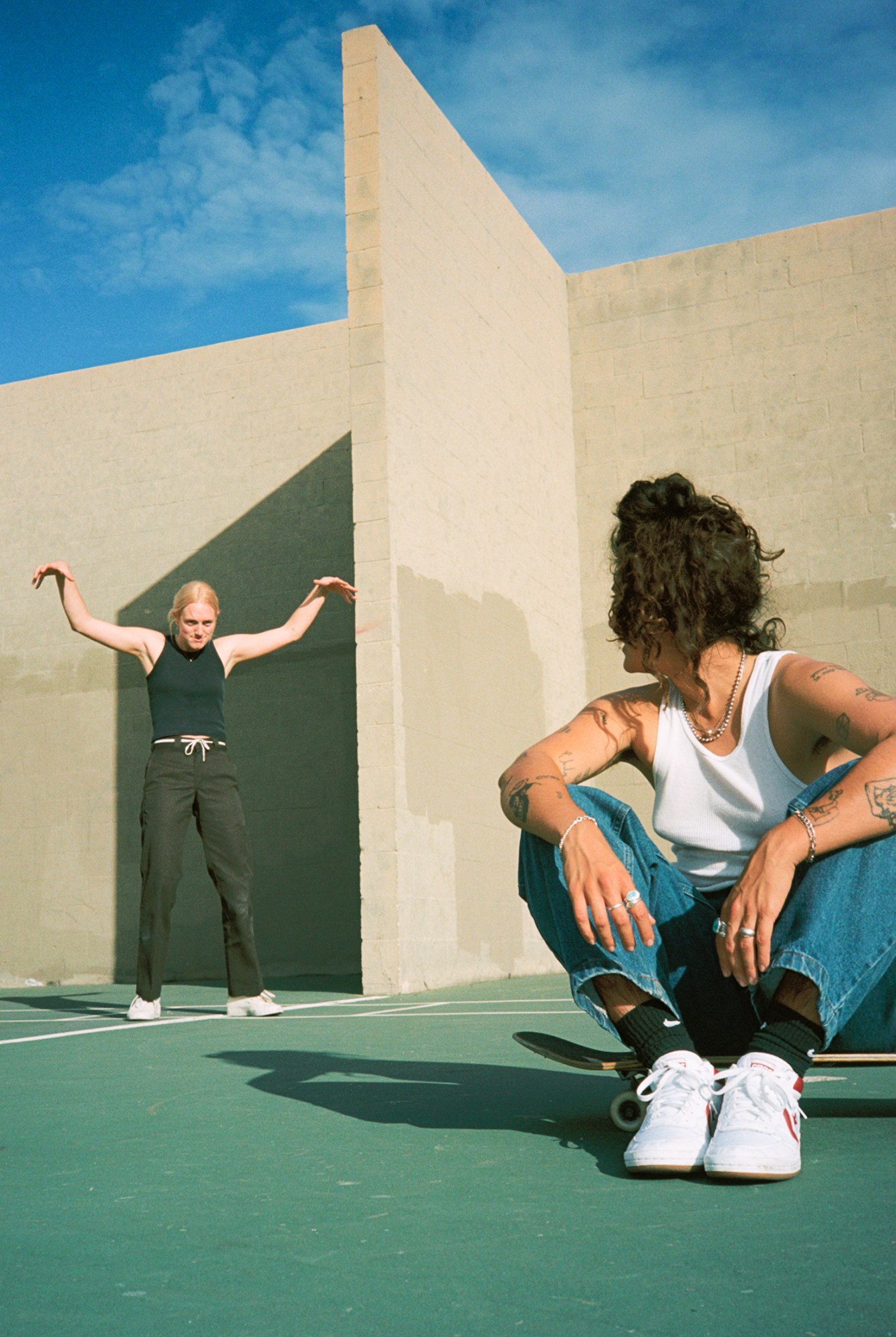 two skaters messing around at the skate park in la