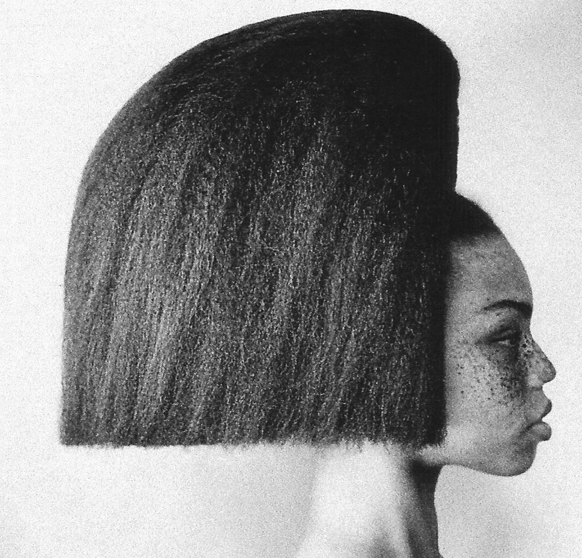 A model with a high, quarterspherical hairdo