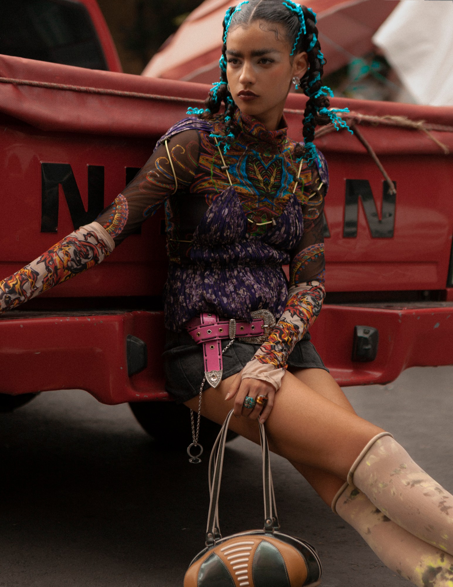 model maria gonzalez rojas posing on the back of a truck in mexico city