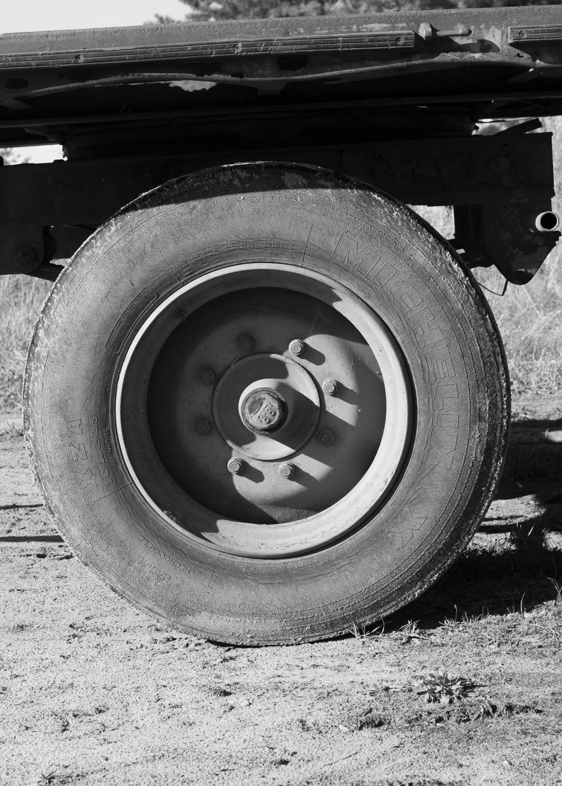 a black and white picture of a tyre