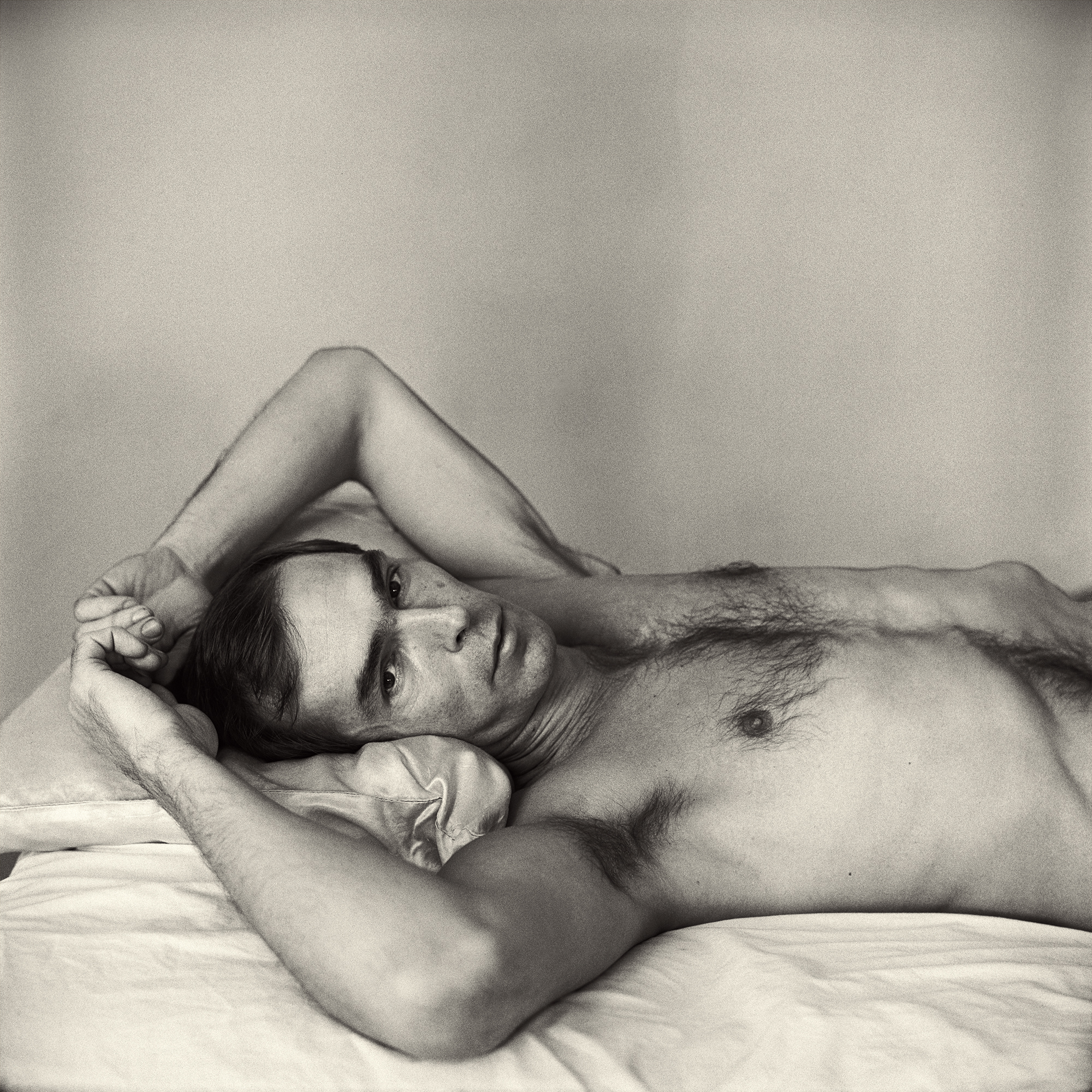 peter hujar lies on his back wearing no shirt