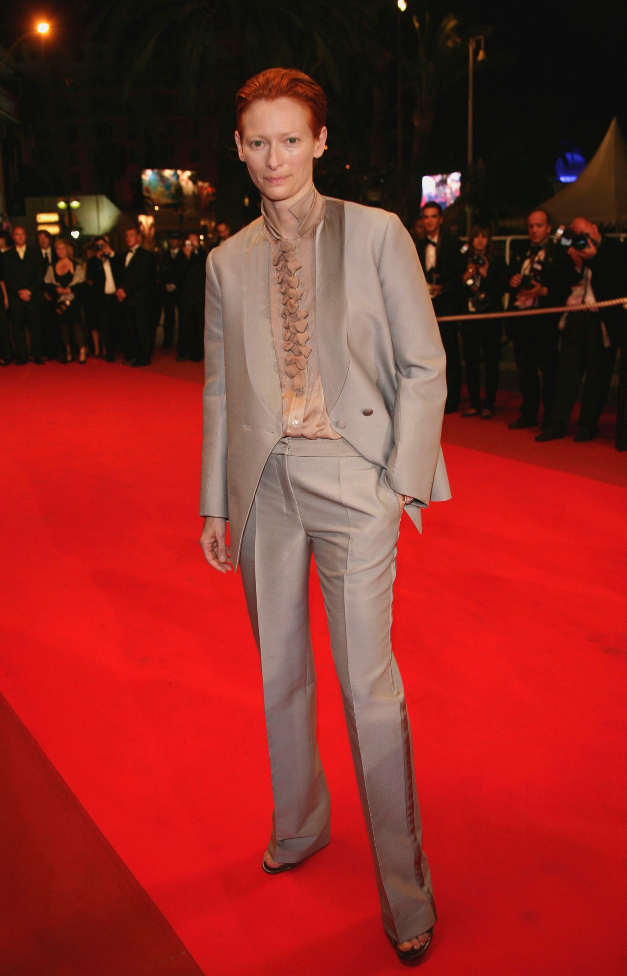 tilda swinton wearing a beige/brown suit on the red carpet at cannes in 2007