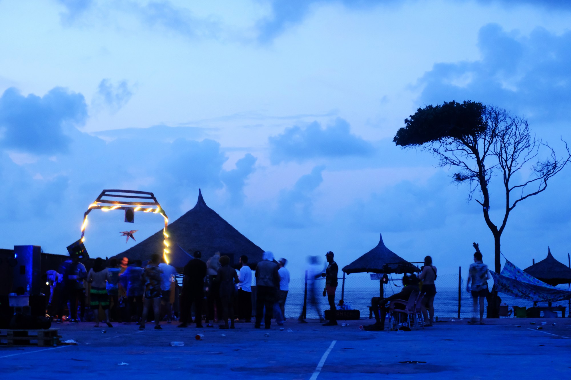 an outdoor rave in lagos as it turns to morning