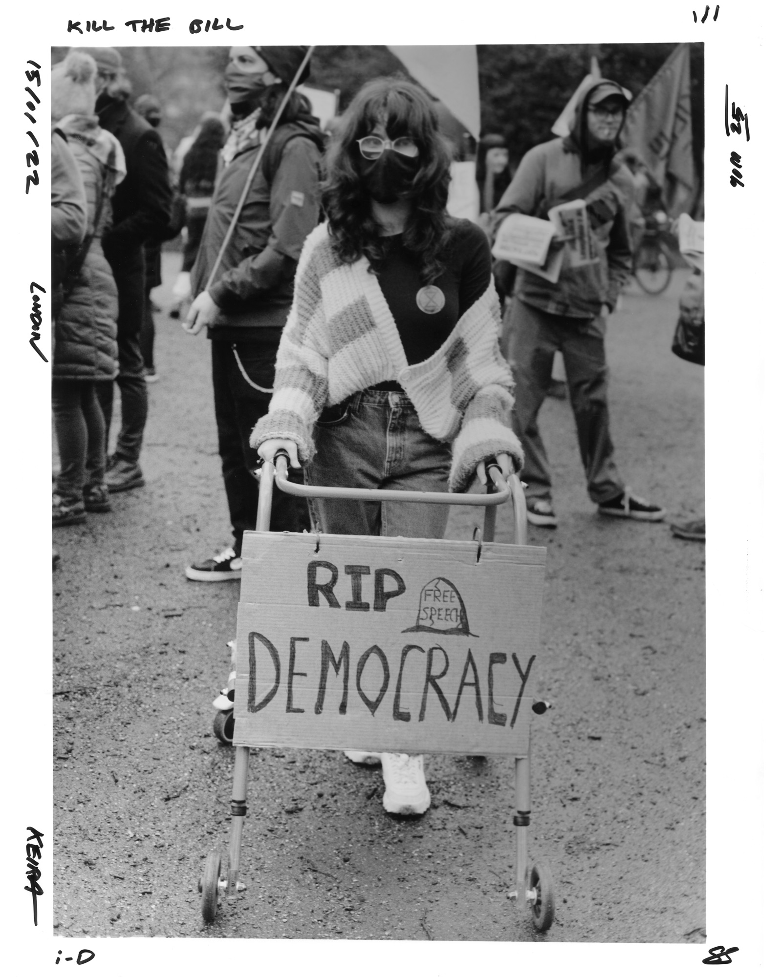 Protester with an RIP democracy sign on their walking frame at the Kill the Bill protest