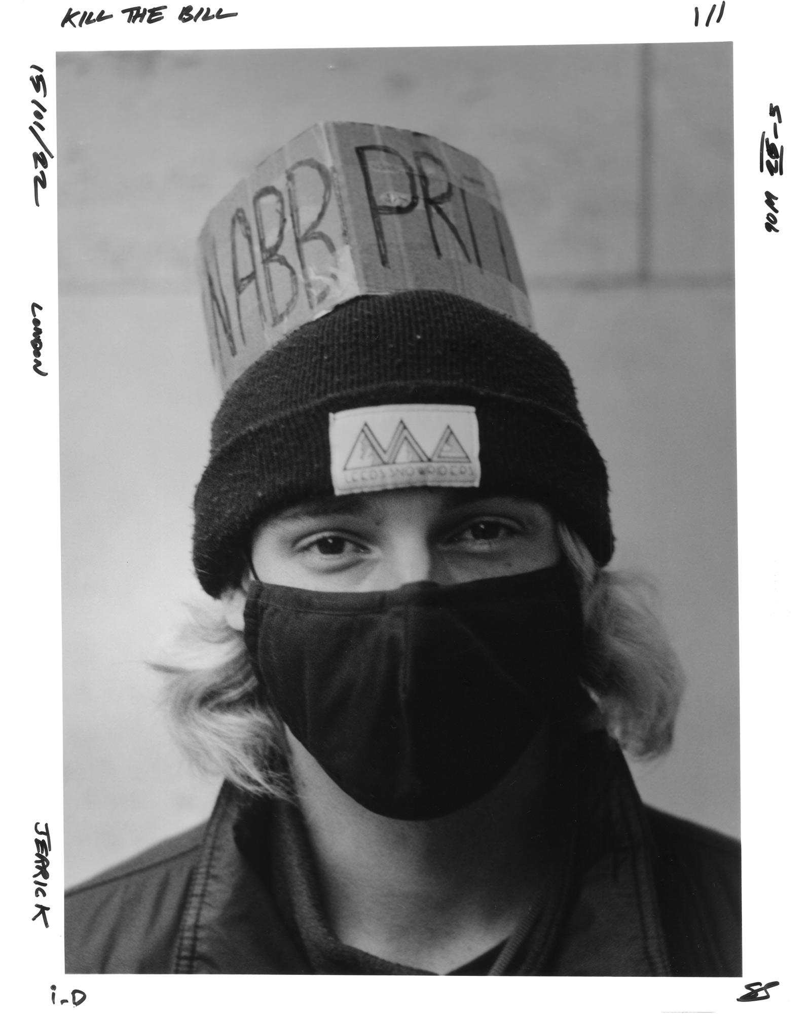 Protester wearing a sign on his hat at the kill the bill protest.