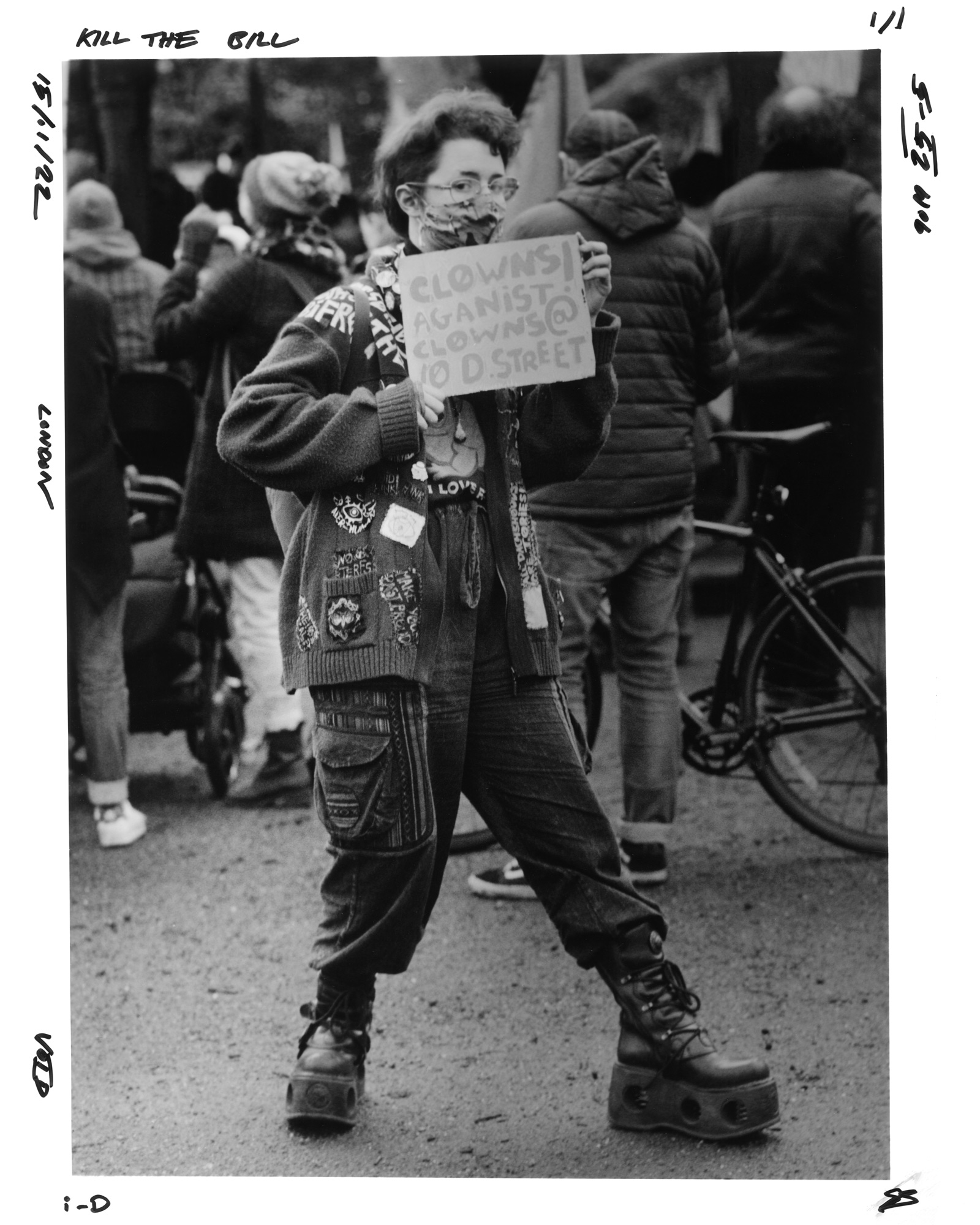 Protester holding a sign saying clowns against clowns @ 10 D Street at the Kill the Bill protest