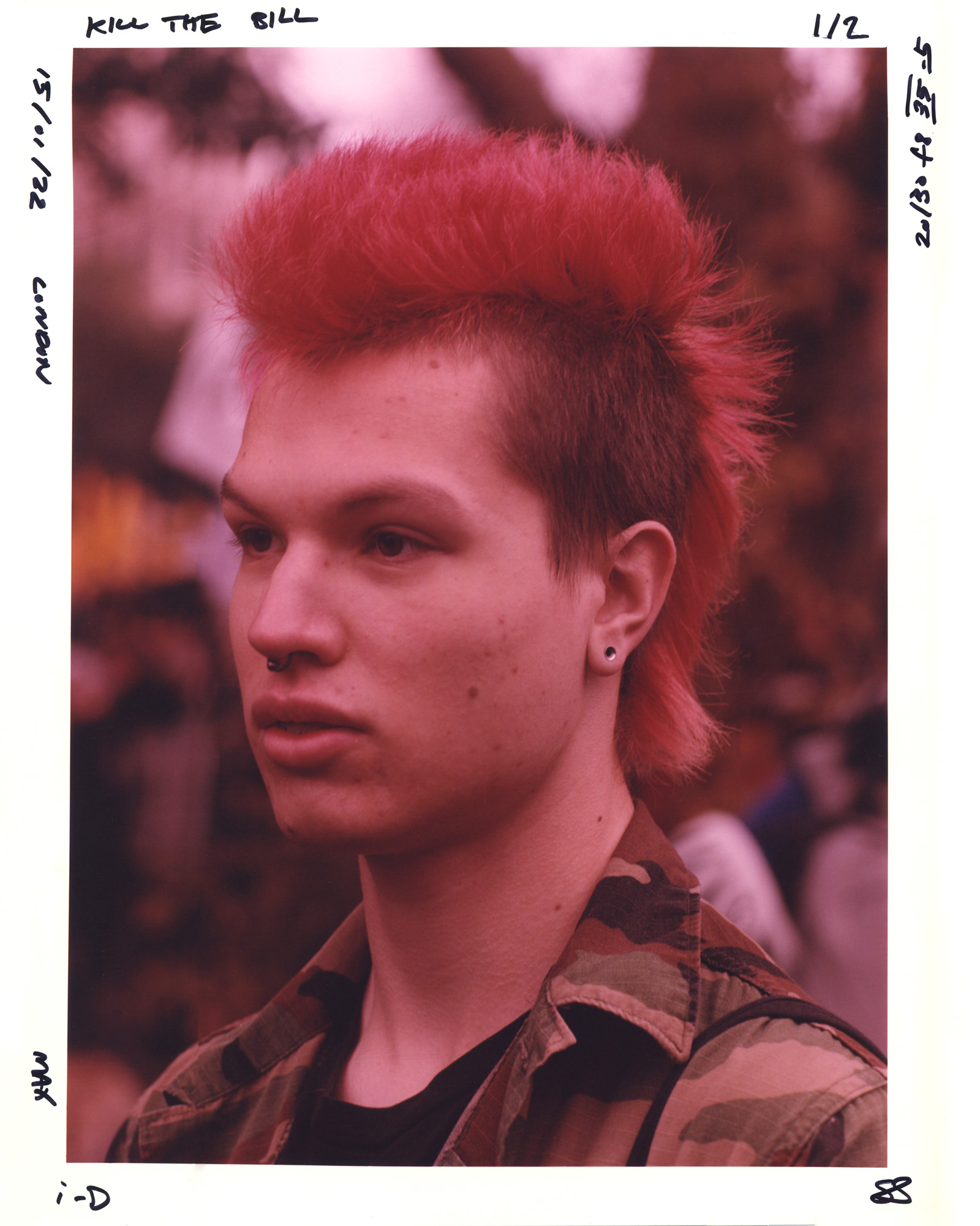 close up of a protester with a khaki jacket and red mohawk at the Kill the Bill protest