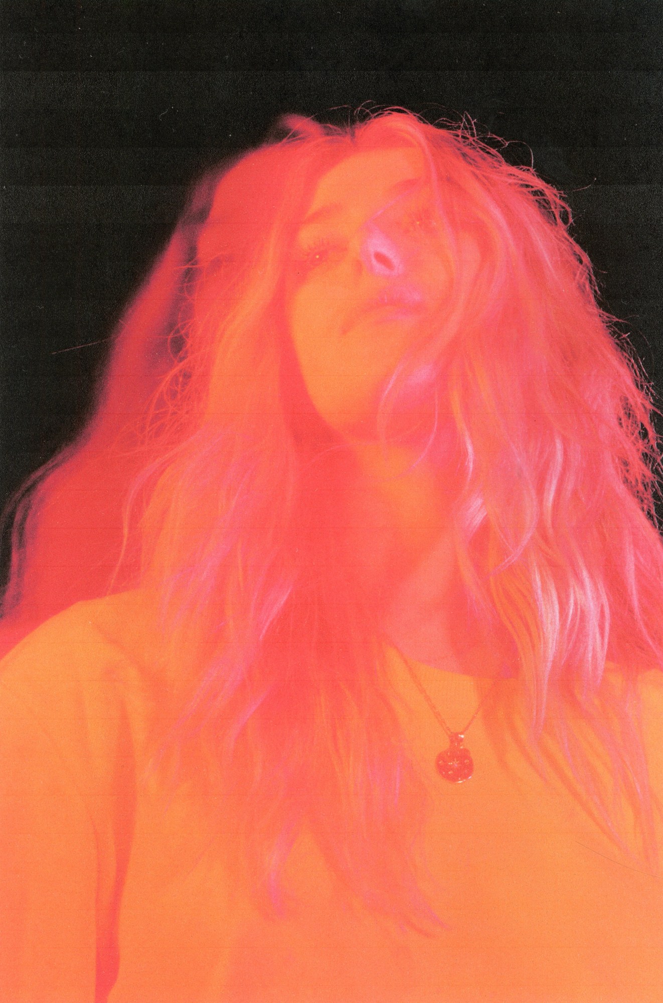 a pink and orange tinged portrait of honor swinton byrne